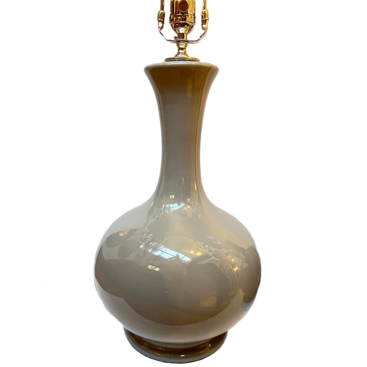 Pair of 1960's French porcelain lamps.

Measurements:
Height of body:17