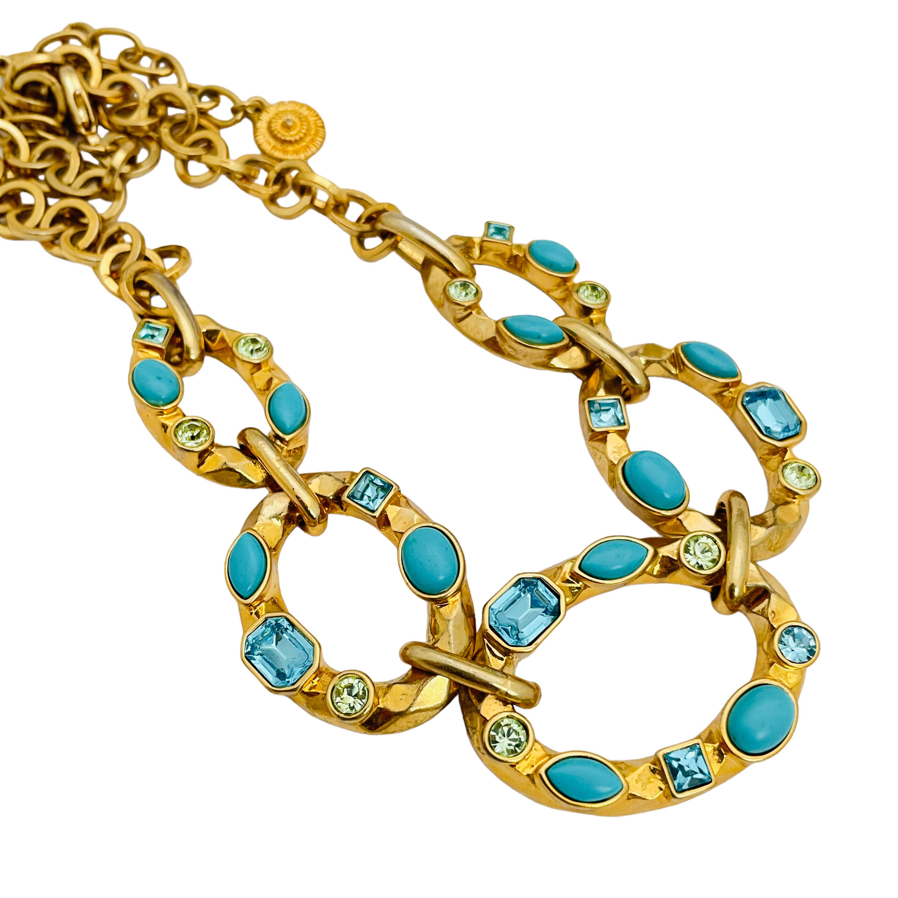 DETAILS

• signed GRAZIANO

• gold tone with faux stones

• vintage designer runway necklace 

MEASUREMENTS

• 19