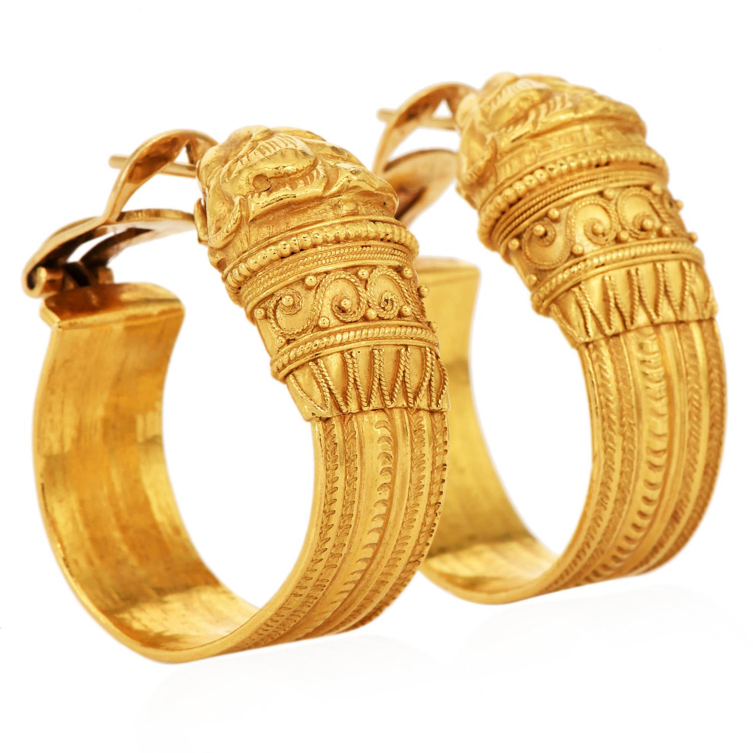 Greek Designer Vintage  21K Yellow Gold Chimera Hoop Earrings

Crafted in 21K yellow gold Exquisite Chimera lion detailing captured in a wide hoop style, showcasing traditional Greek craftsmanship.

Each earring measures 32mm in length and 28mm in