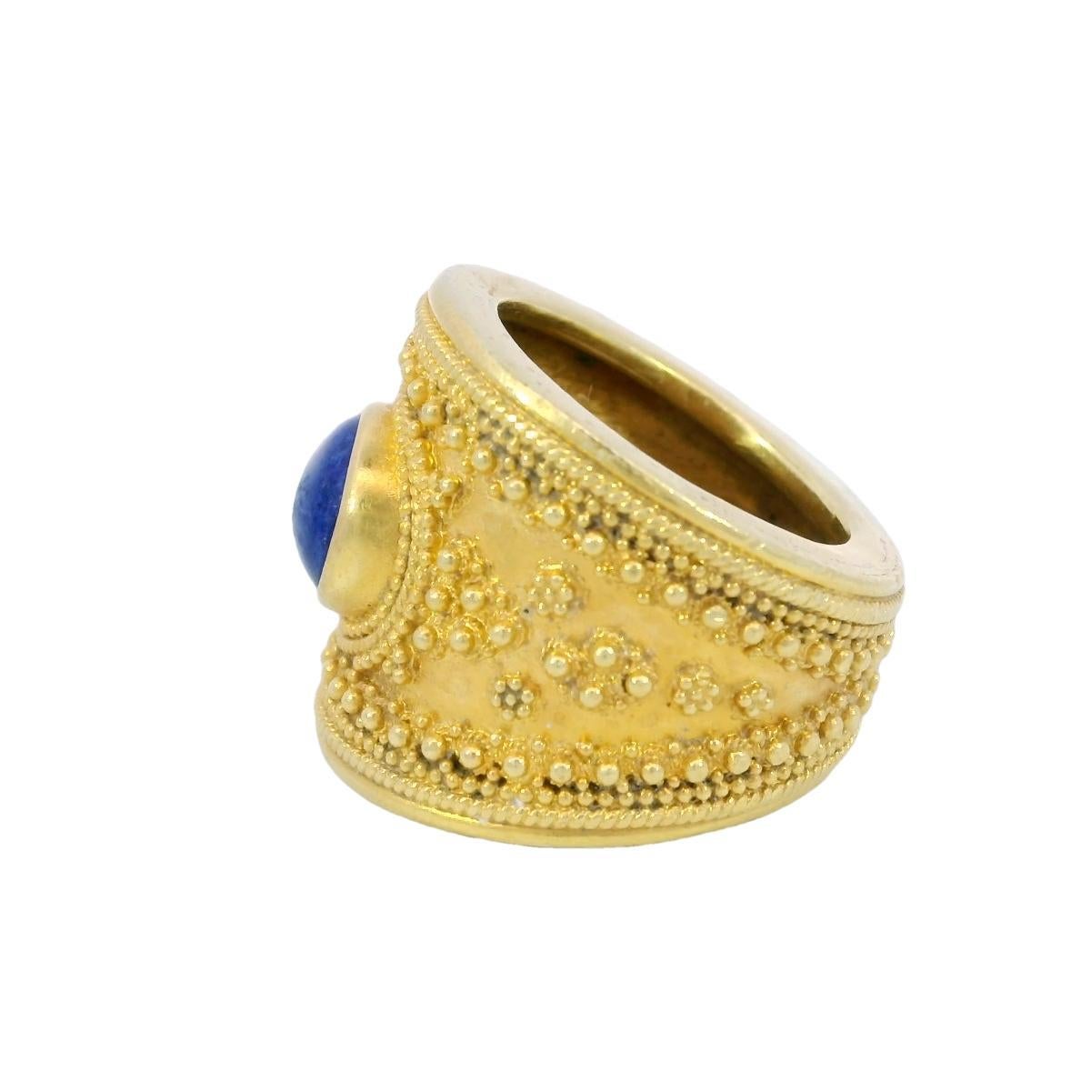 Vintage Greek Lalaounis Cabochon Lapis Hellenistic Ring in 18K Gold

This vintage Ilias Lalaounis ring is a masterpiece of ancient-inspired artistry, blending Hellenistic design with bold, modern craftsmanship. At its center, a vivid blue cabochon