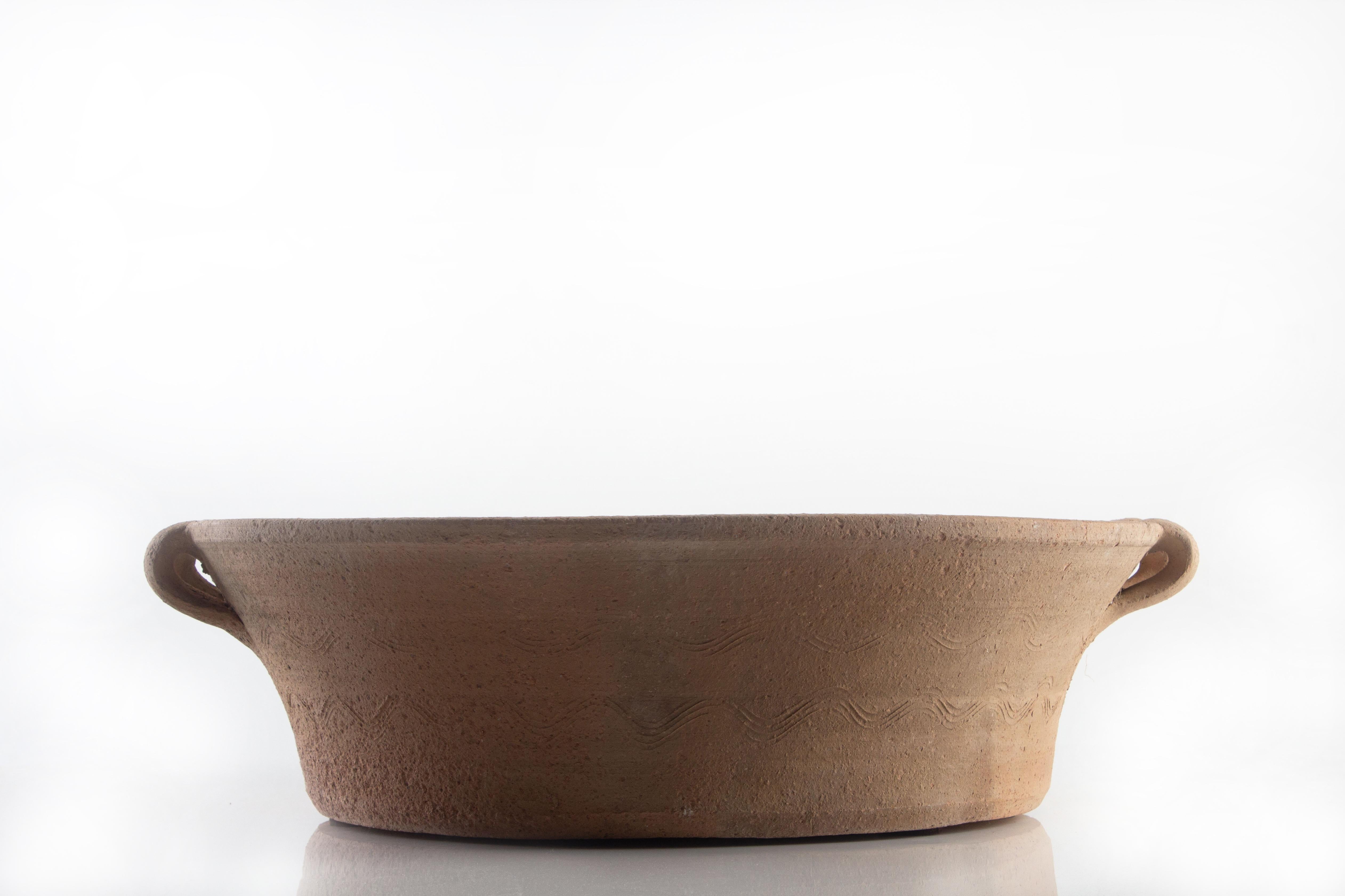 Vintage Greek terracotta storage bowl.

  