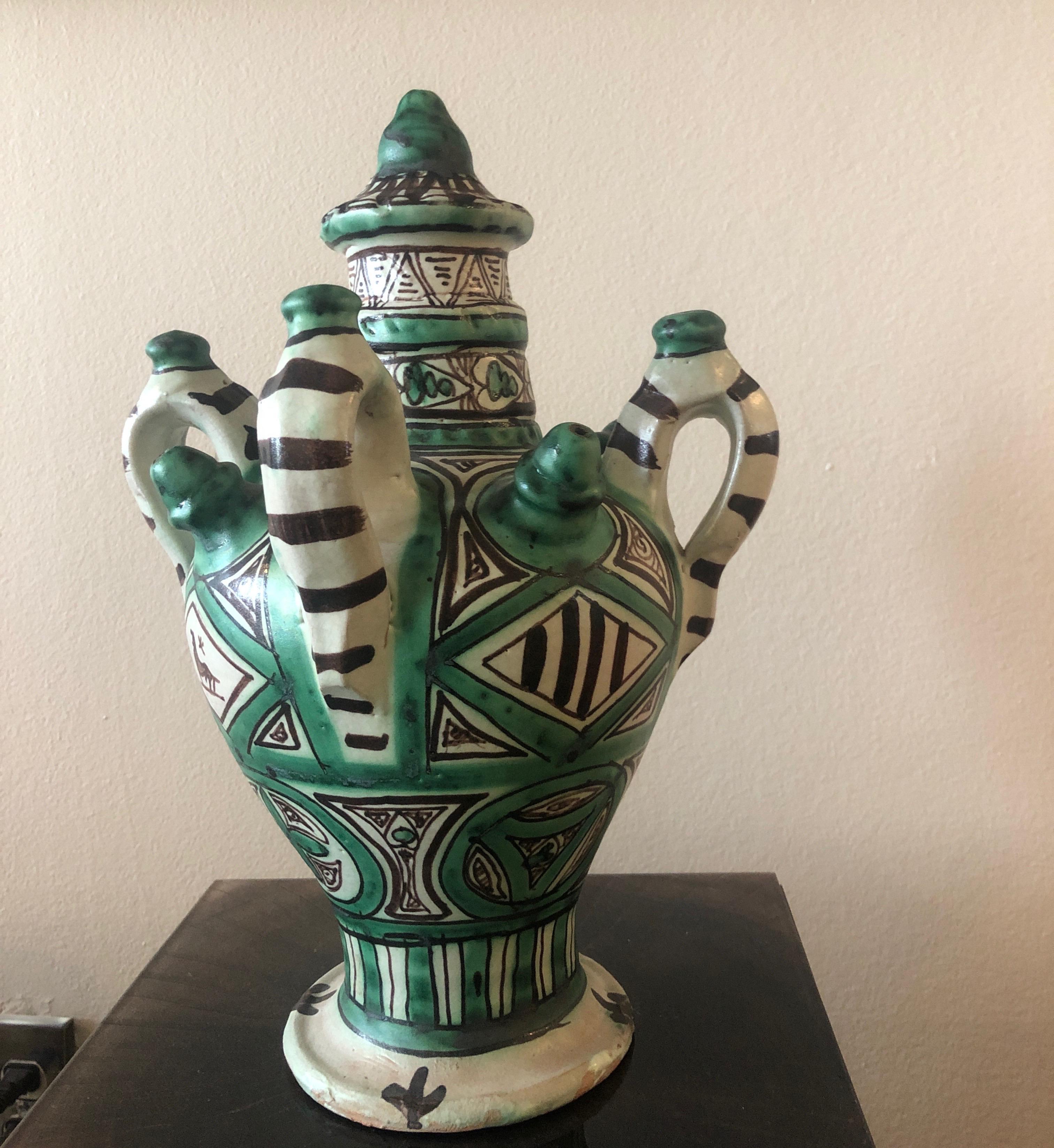 Vintage green and black Mexican Art Pottery with handles.
Size: 11