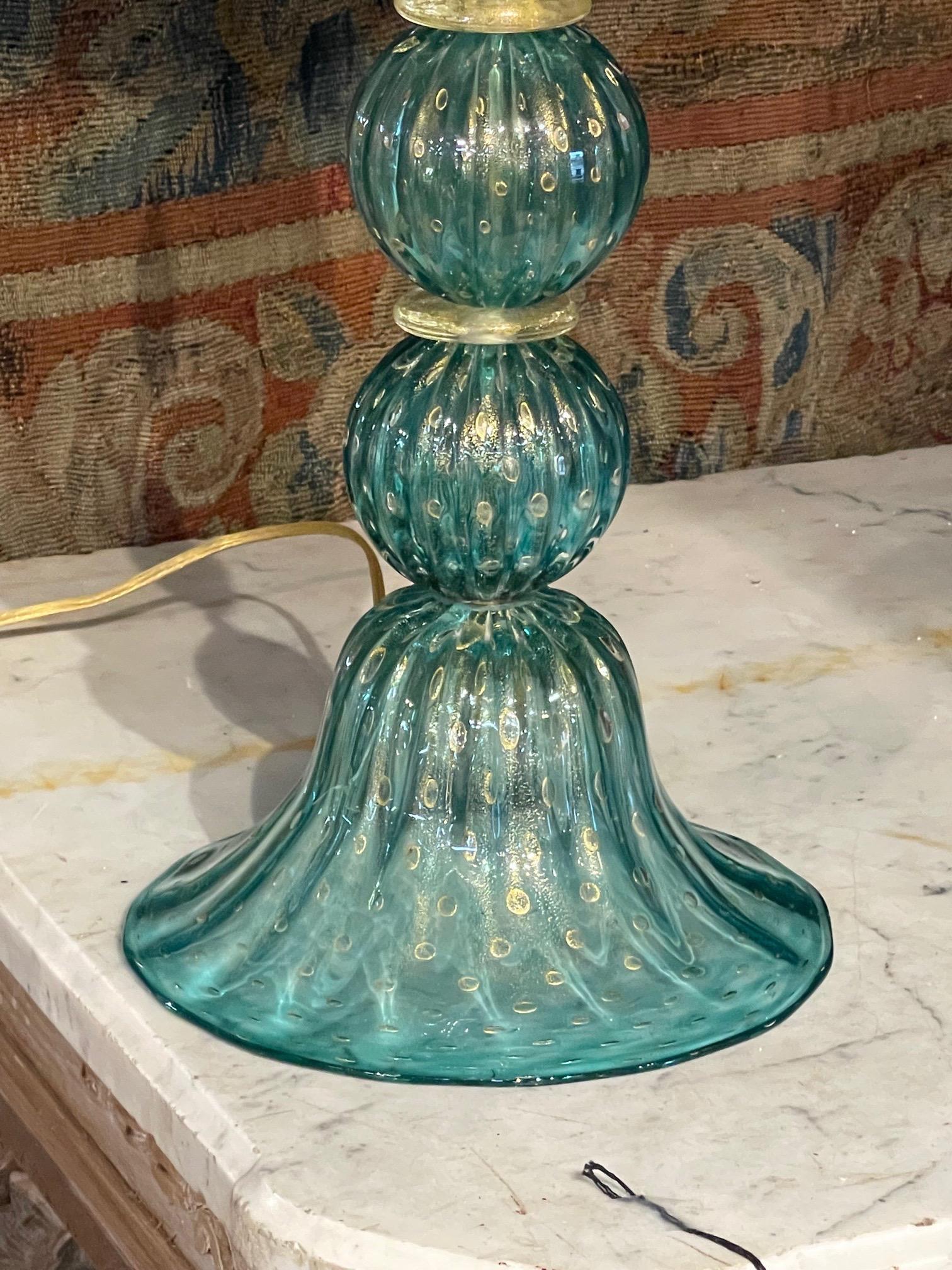 Lovely vintage green and gold Murano glass lamp. Beautiful glistening glass and pretty lamp shade as well. 
Nice!.