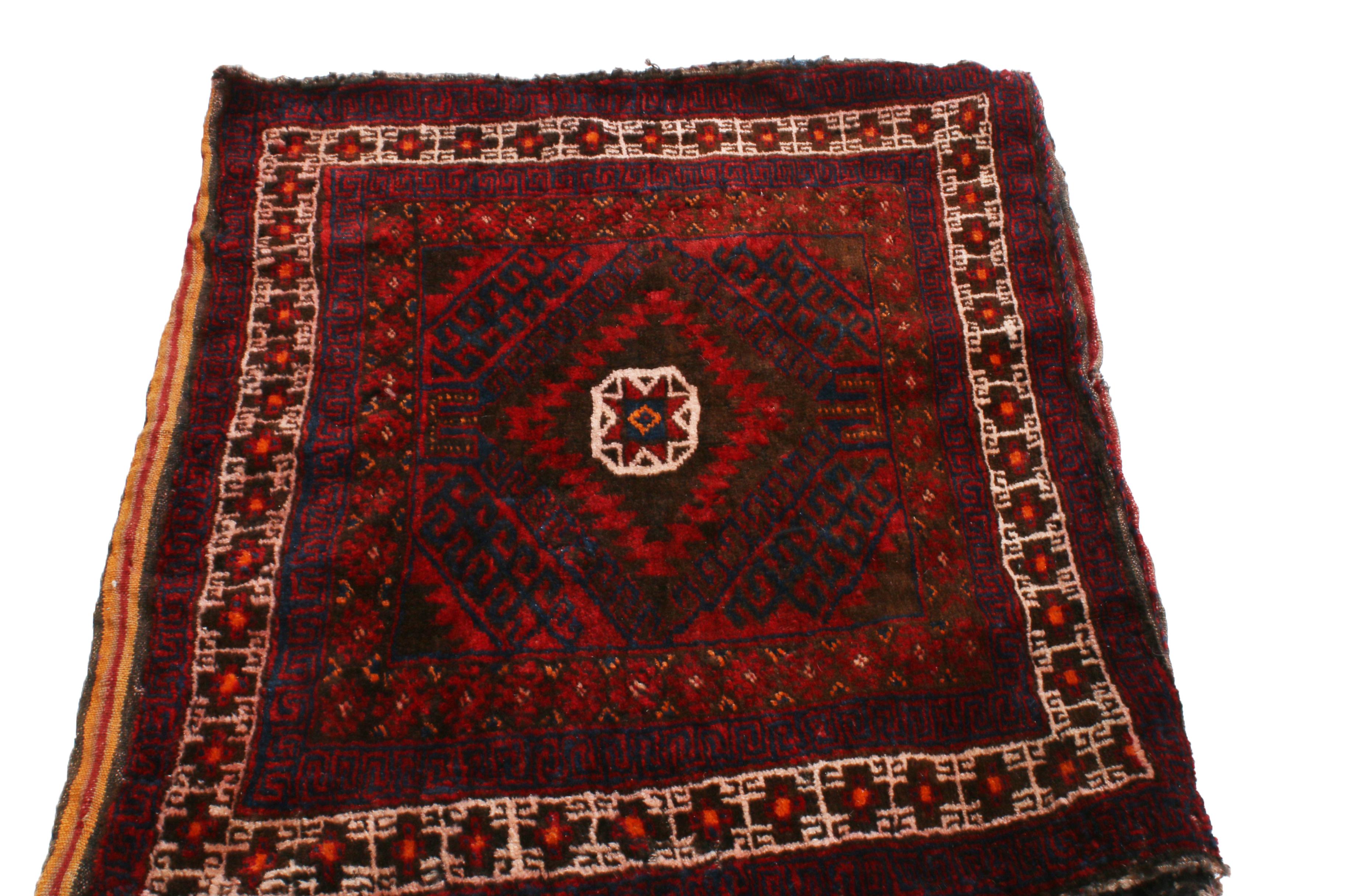 Originating from Persia between 1930-1950, this vintage Persian rug is hand knotted with a durable, luminous wool body with a rich and bright combination of field and border motifs strongly resembling the oriental symbols for the eight-pointed star