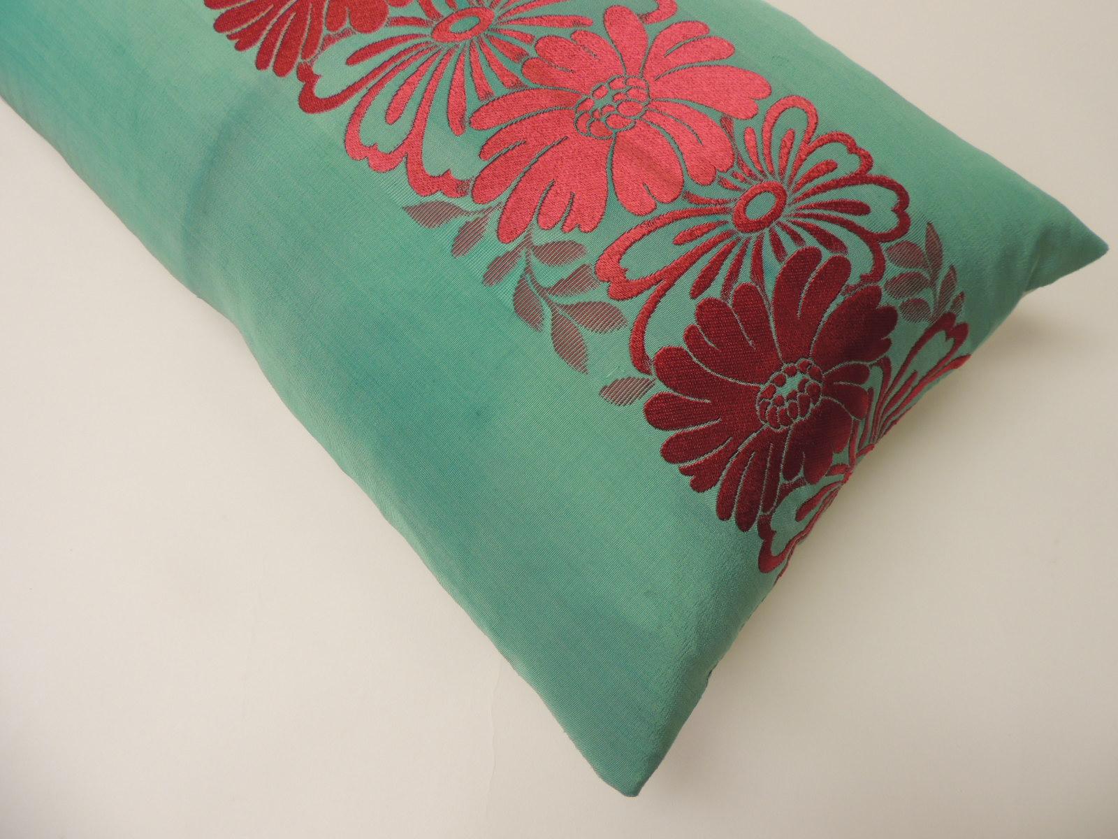 Silk Obi sash embroidered decorative lumbar pillow. Vintage textile panel is aqua silk with red embroidered flowers. Decorative lumbar pillow backing is on a mint color silk. Decorative pillow handcrafted and designed in the USA. Closure by stitch