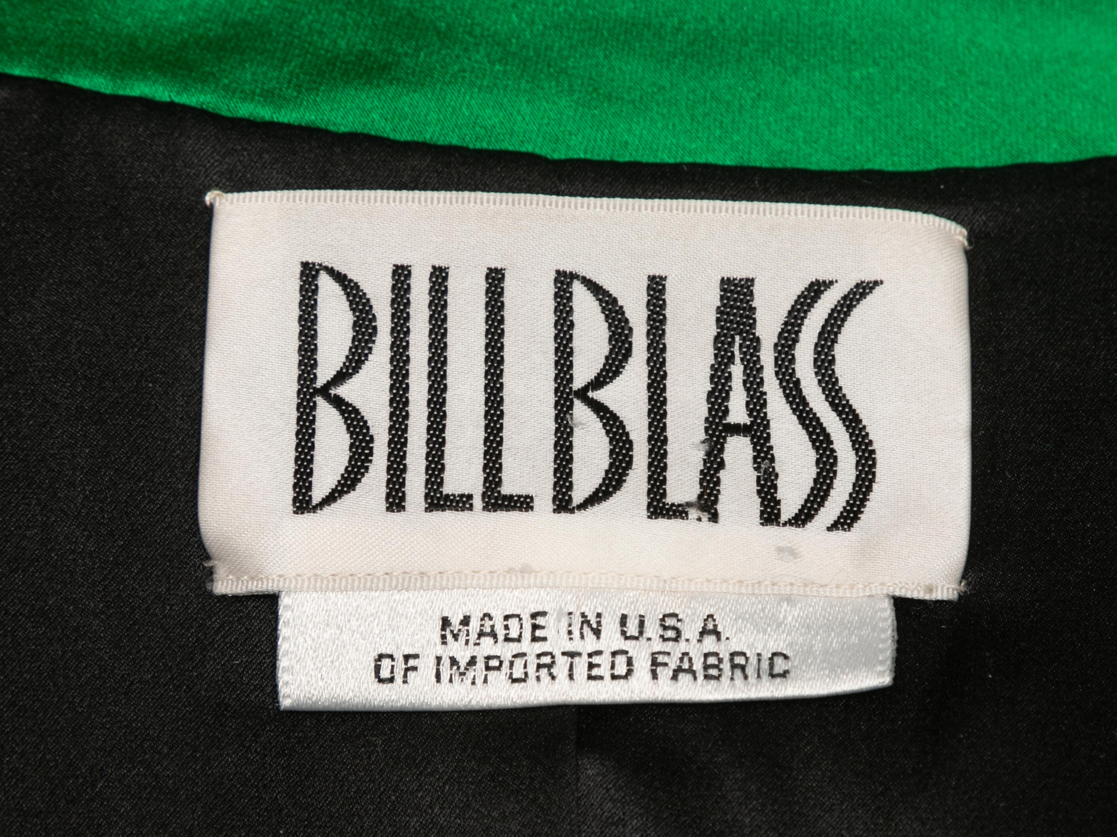 Vintage green satin jacket by Bill Blass. Pointed collar. Four front pockets. Button closures at front. 44
