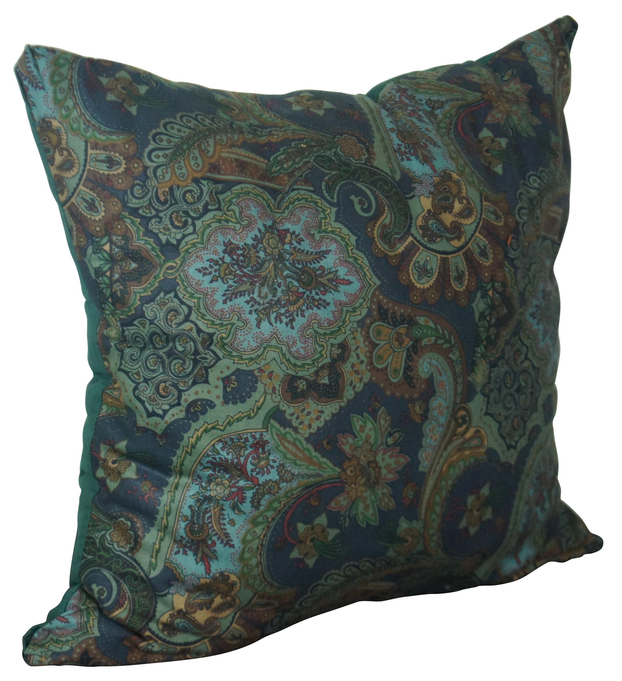 Vintage fiber filled pillow with a printed linen front in blue, green and brown paisley, and a green cotton back.