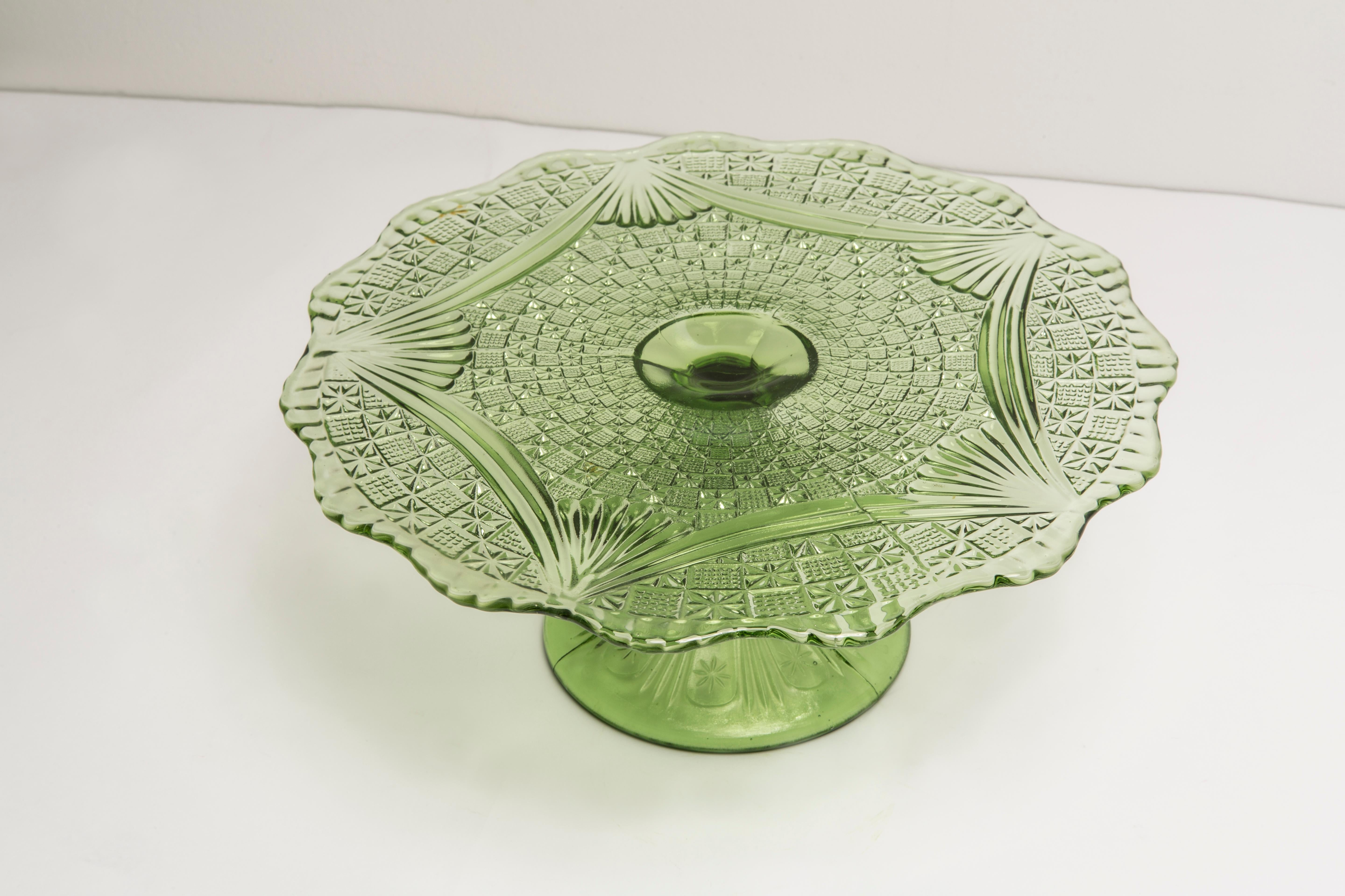 Beautiful decorative green glass plate/cake stand from Italy. 
Plate is in very good vintage condition, no damage or cracks. 
Original glass. Unique piece for every table and interior! 
Only one piece available.