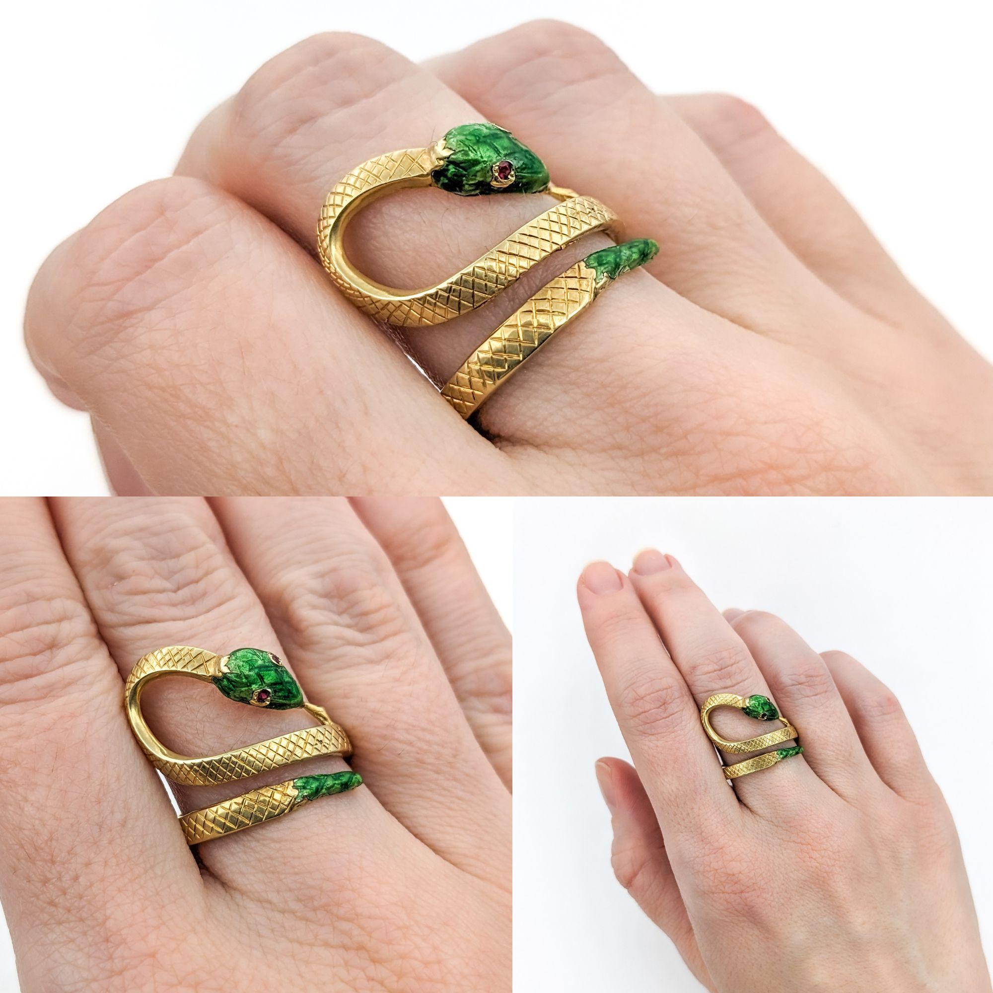 Vintage Green Enamel Snake Ring with Ruby Eyes In Yellow Gold

Introducing this playful Mid-Century era Snake Ring, exquisitely crafted in 14k yellow gold. The Snake features .02ctw of round rubies for eyes, adding a touch of color and personality. 