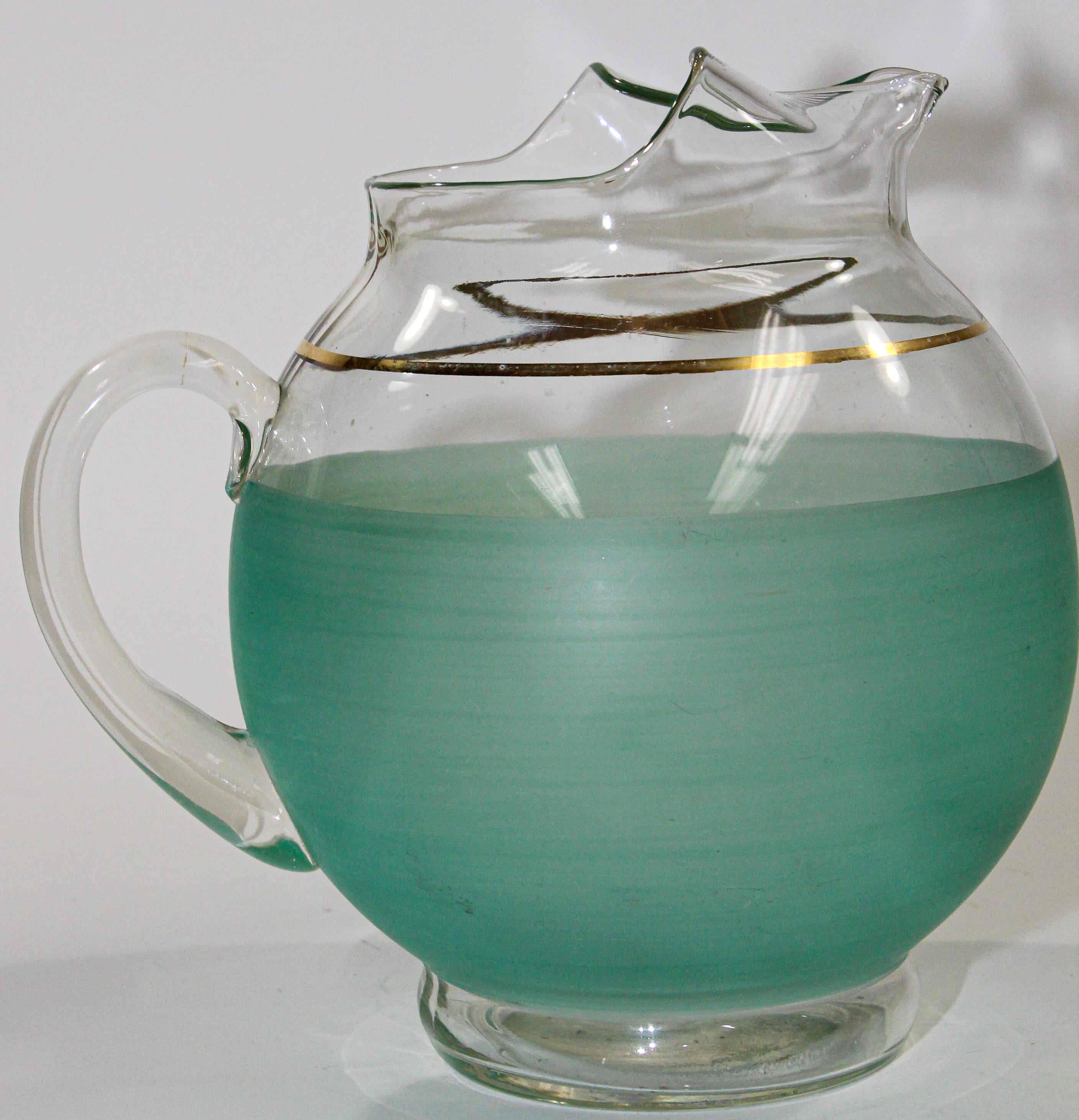 fenton green glass pitcher