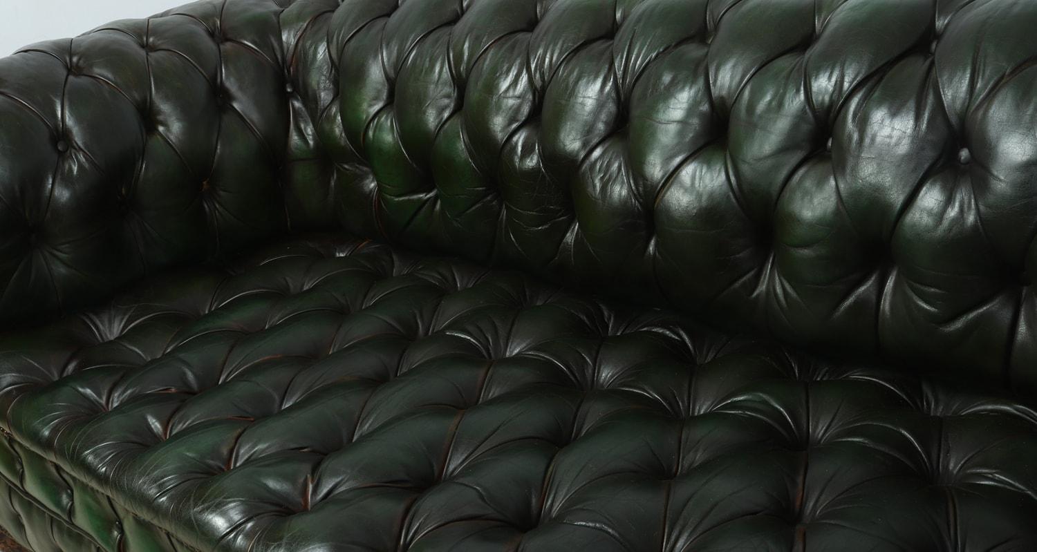 Vintage green leather Chesterfield

A very good quality thick leather Chesterfield with solid hardwood frame, coil sprung seat arms and back, with deep buttoned leather upholstery, in very good condition with no rips tears or buttons missing
Age: