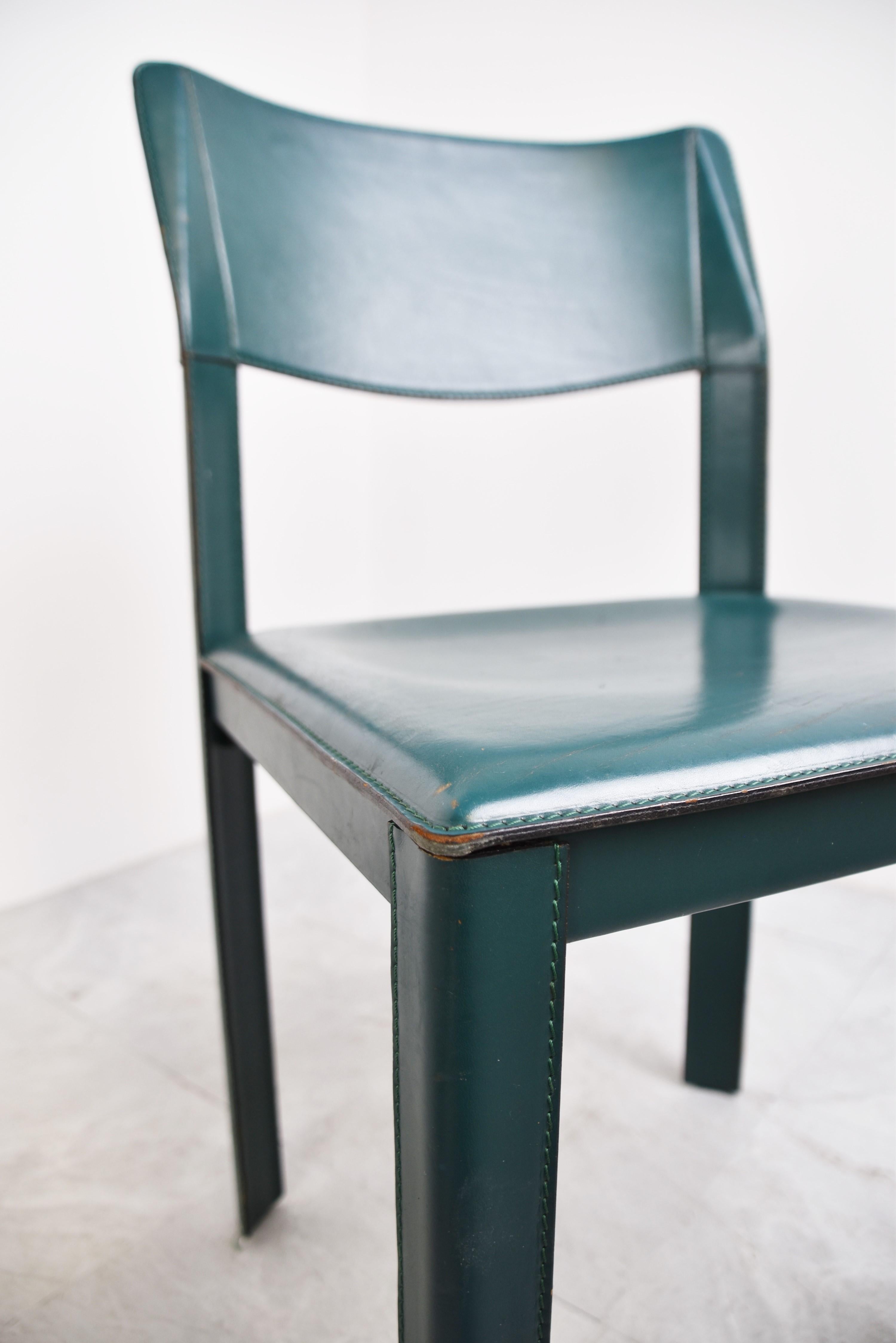 Vintage green leather dining chairs.

High quality and sturdy stiched leather dining chairs with a timeless design. 

Overall good condition with age related wear, some more wear to the legs, but the chairs still look attractive

1970s -