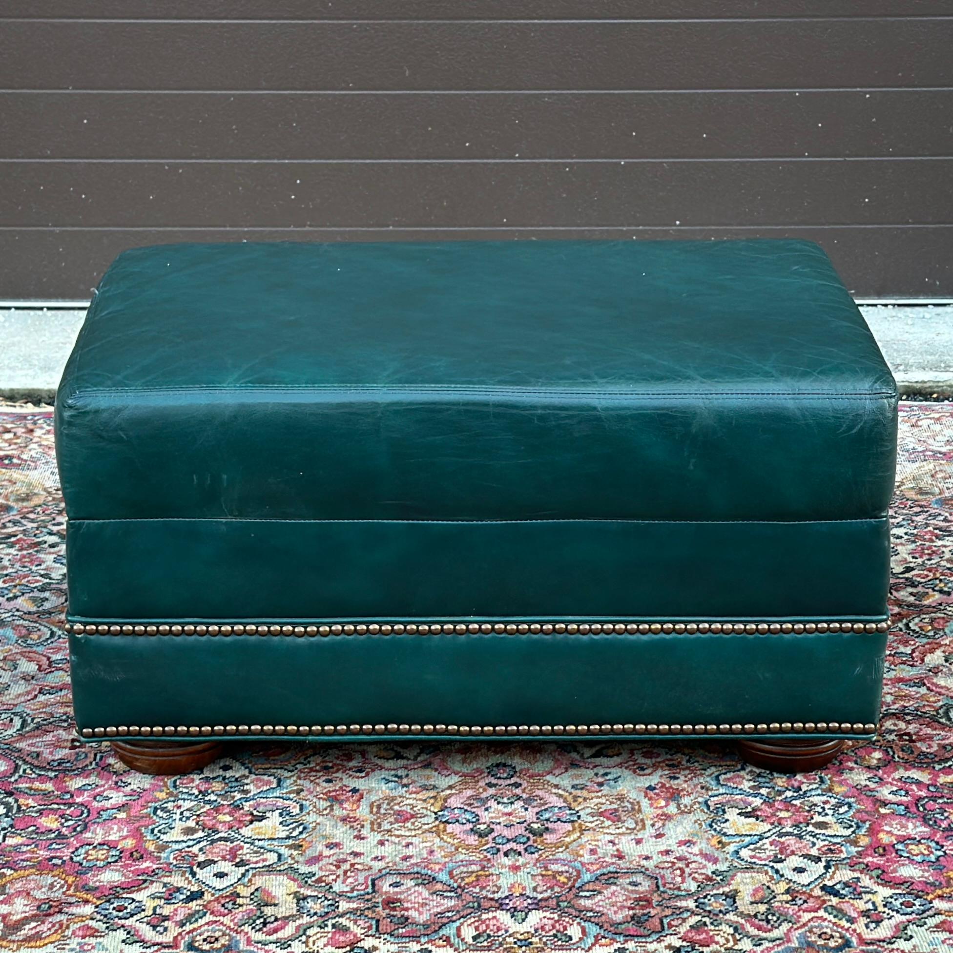 Vintage Green Leather Ottoman on Bun Feet With Brass Tack Trim by Hickorycraft
Matching lounge chair and loveseat available at time of listing!