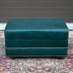 Vintage Green Leather Ottoman on Bun Feet With Brass Tack Trim