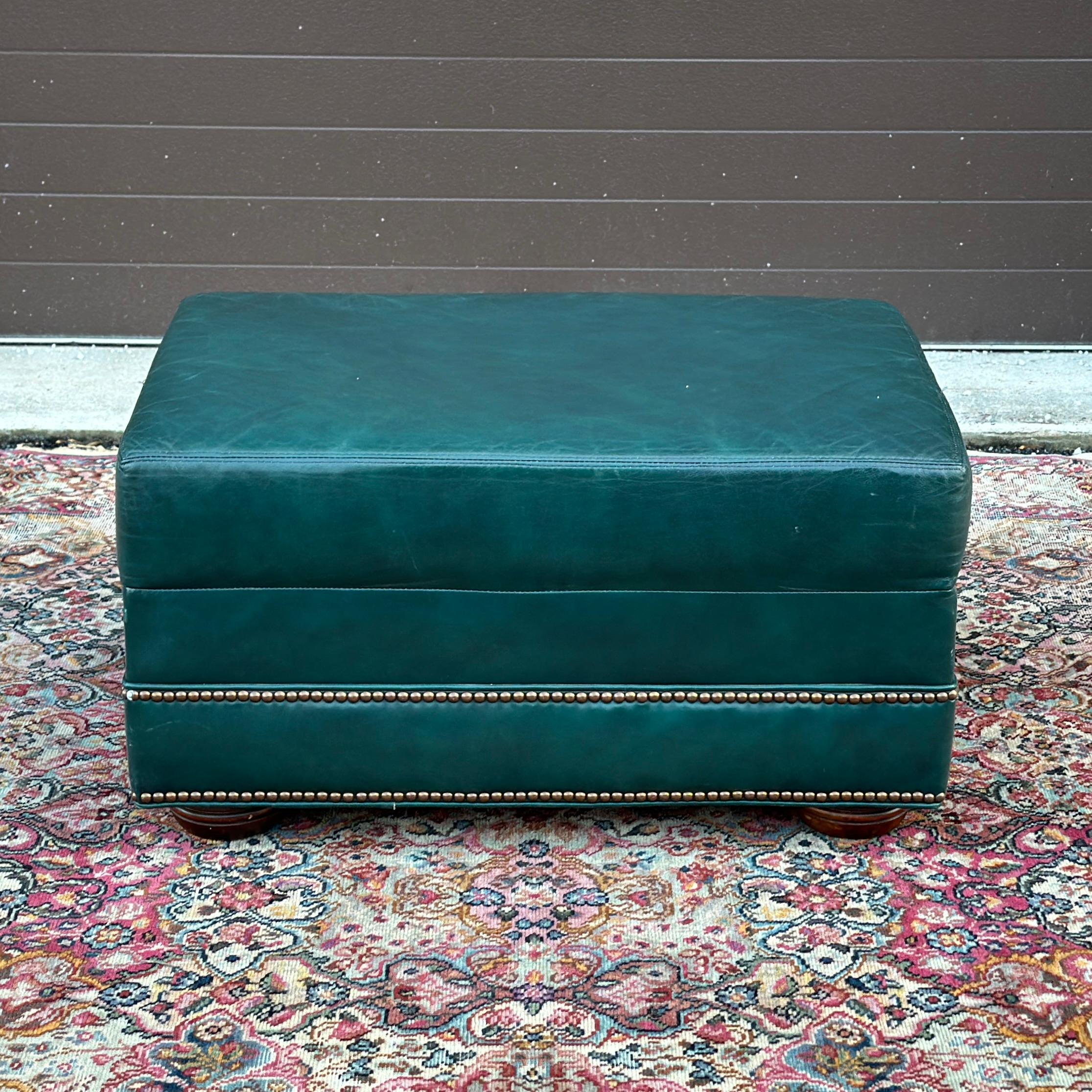 Hand-Crafted Vintage Green Leather Ottoman on Bun Feet With Brass Tack Trim