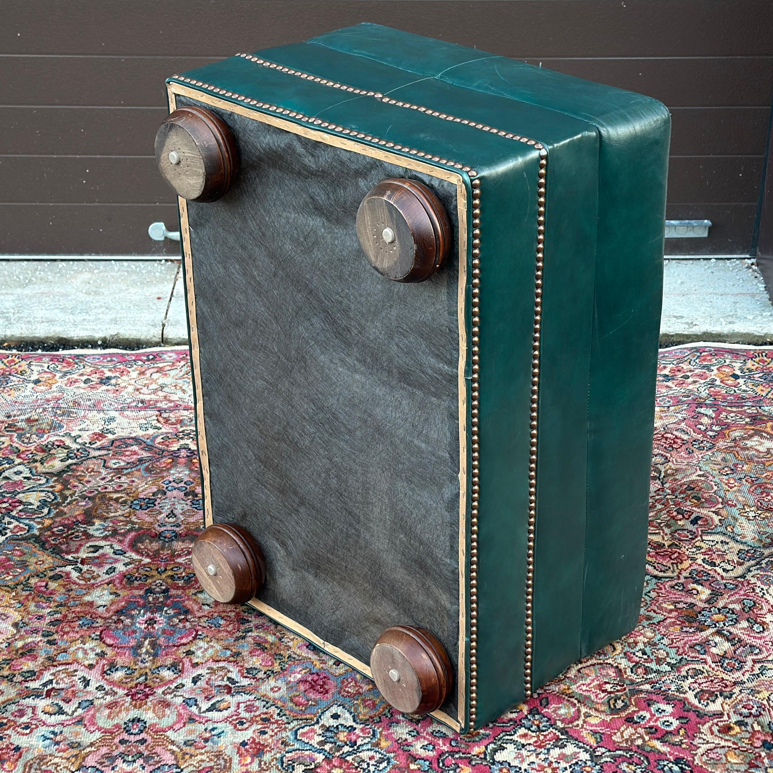 20th Century Vintage Green Leather Ottoman on Bun Feet With Brass Tack Trim