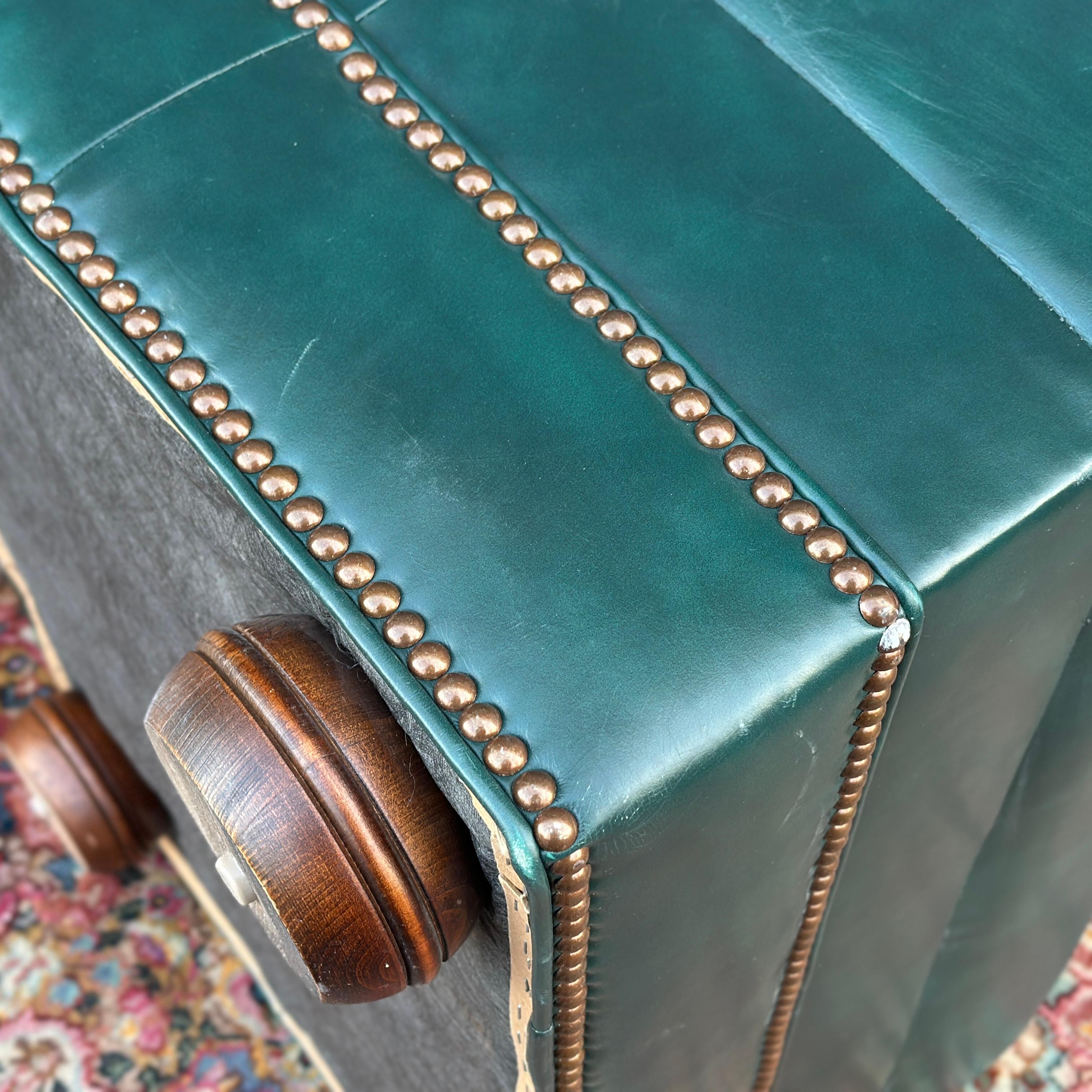 Vintage Green Leather Ottoman on Bun Feet With Brass Tack Trim 1
