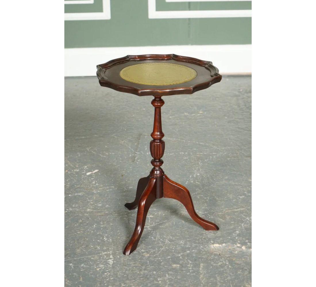We are delighted to offer for sale this Vintage Pie Crust Green Leather Top Plant Wine Side Stand On Tripod Feet.

We have lightly restored this by cleaning, hand waxing and hand polishing.

Condition-wise, there will be some aged-related marks