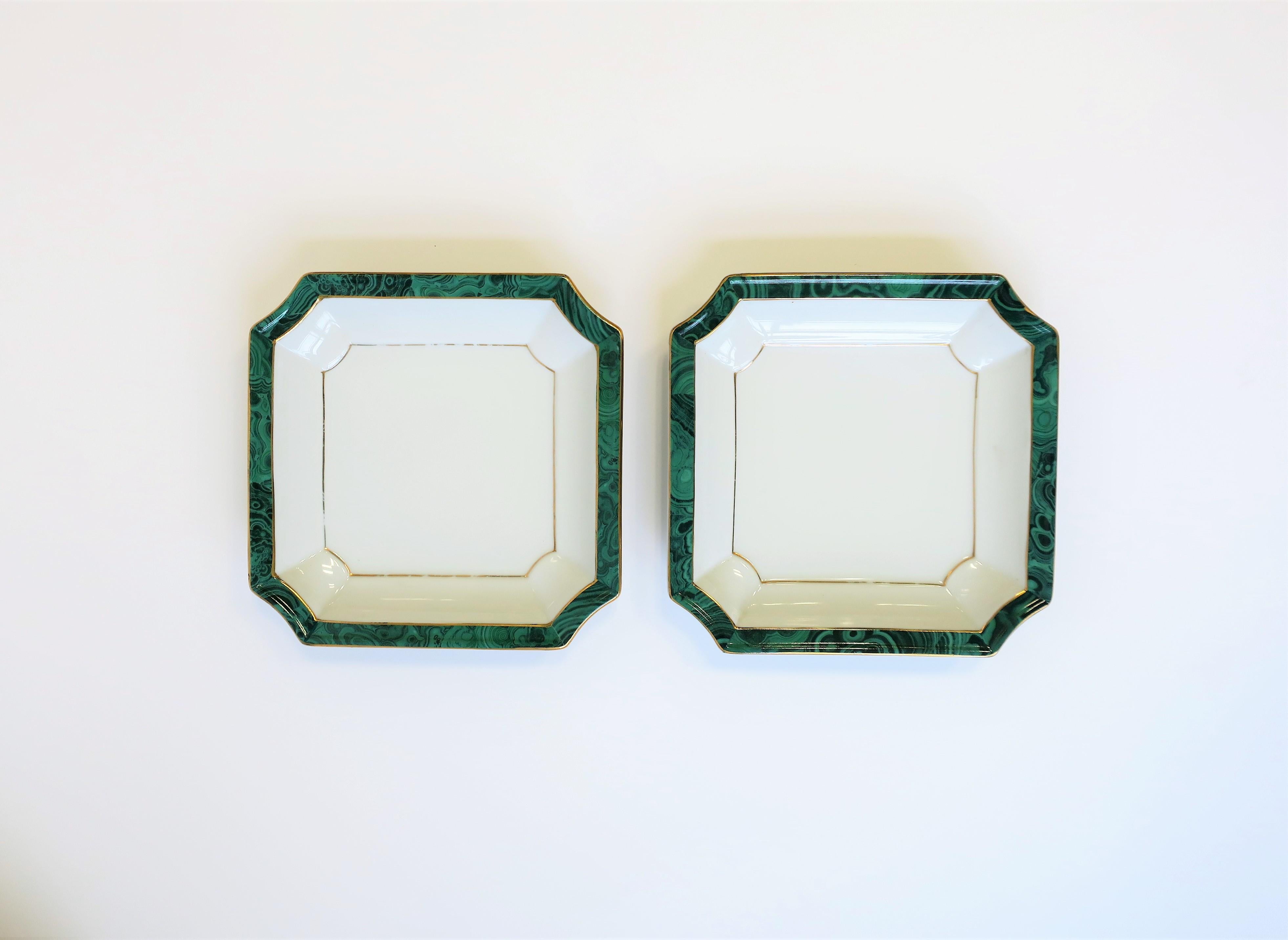 A pair of white ceramic bowls with a green malachite design style and gold accent decorative edge, circa 1980s. A great set for entertaining; Dips, vegetables, etc. Dimensions: 8