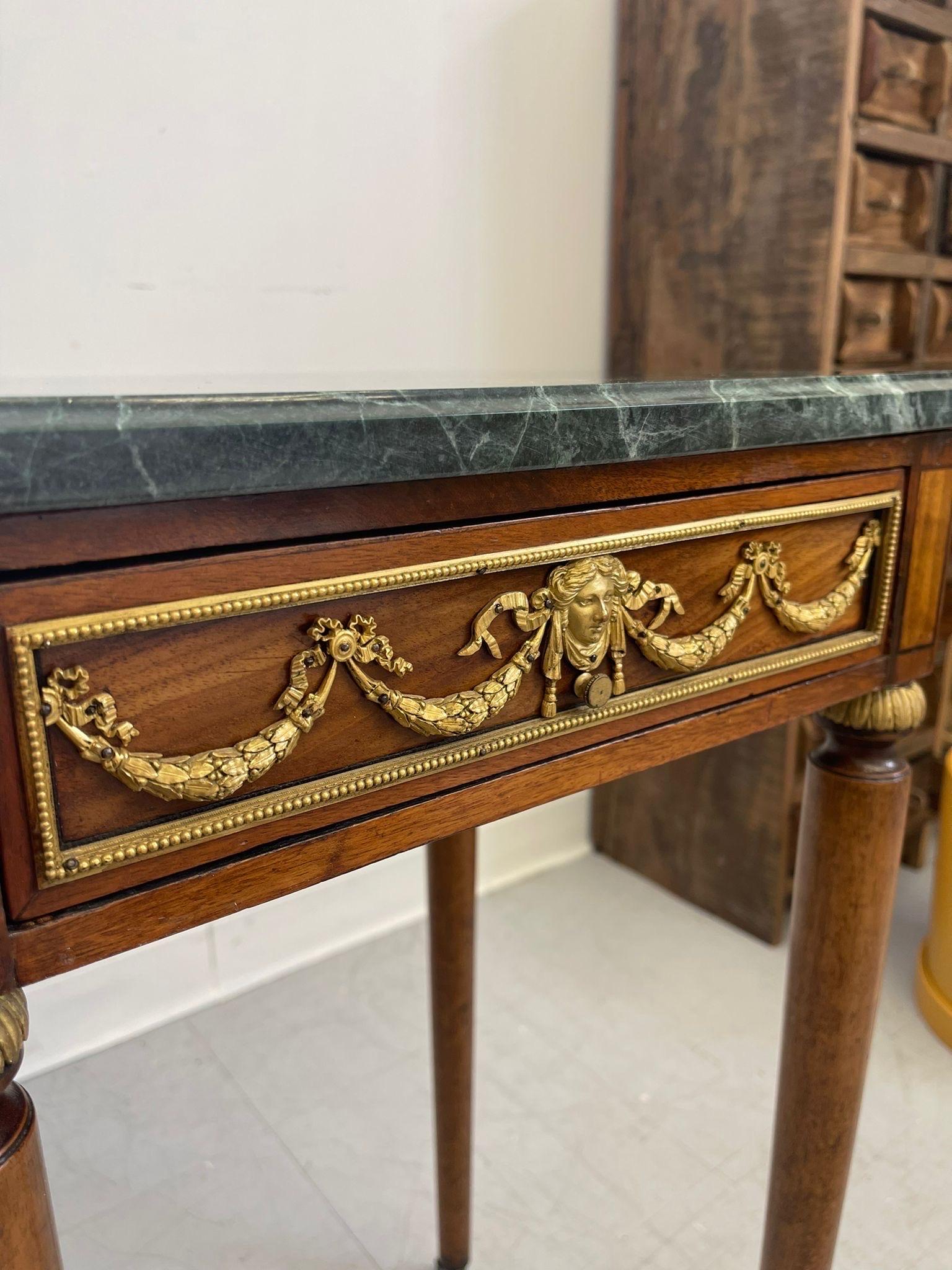 Wood Vintage Green Marble Top Stand on Wheels With Gold Colored Motif of Woman. For Sale