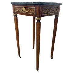 Vintage Green Marble Top Stand on Wheels With Gold Colored Motif of Woman.