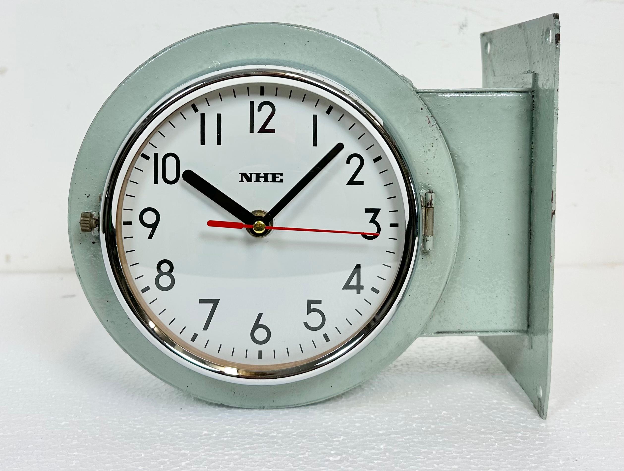 Vintage NHE ( NIPPON HAKUYO electronics,ltd. ) navy slave clock designed during the 1980s in Japan. These clocks were used on large Japanese tankers and cargo ships. It features a light green metal body, a metal dials and a convex clear glass covers
