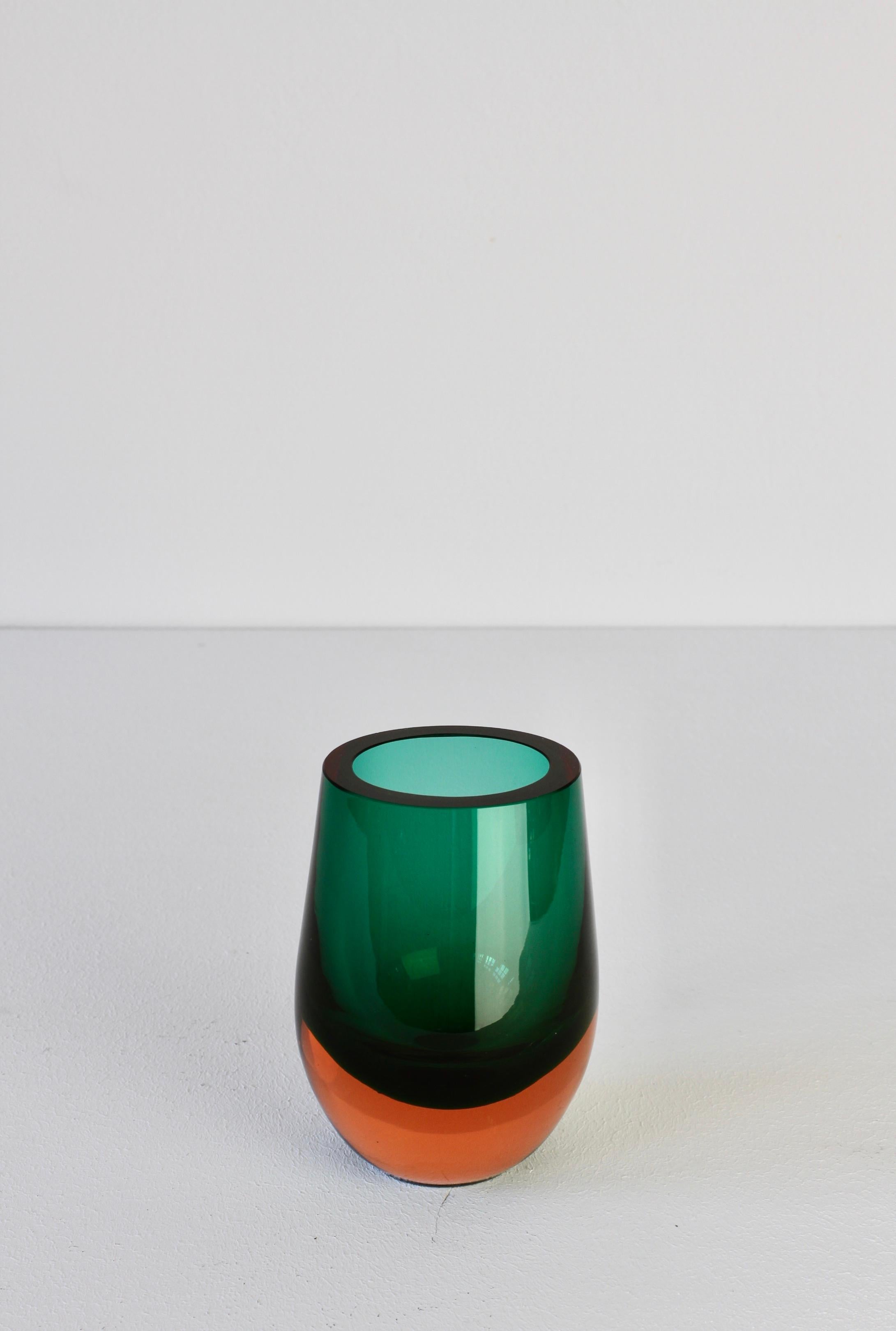 Vintage emerald green and burnt orange glass vase, using the Sommerso (submerged) technique (as favoured by many Murano glass makers) designed by Konrad Habermeier (1907-1992) for German midcentury glass manufacturer Gral Glas, 1965. Just as elegant