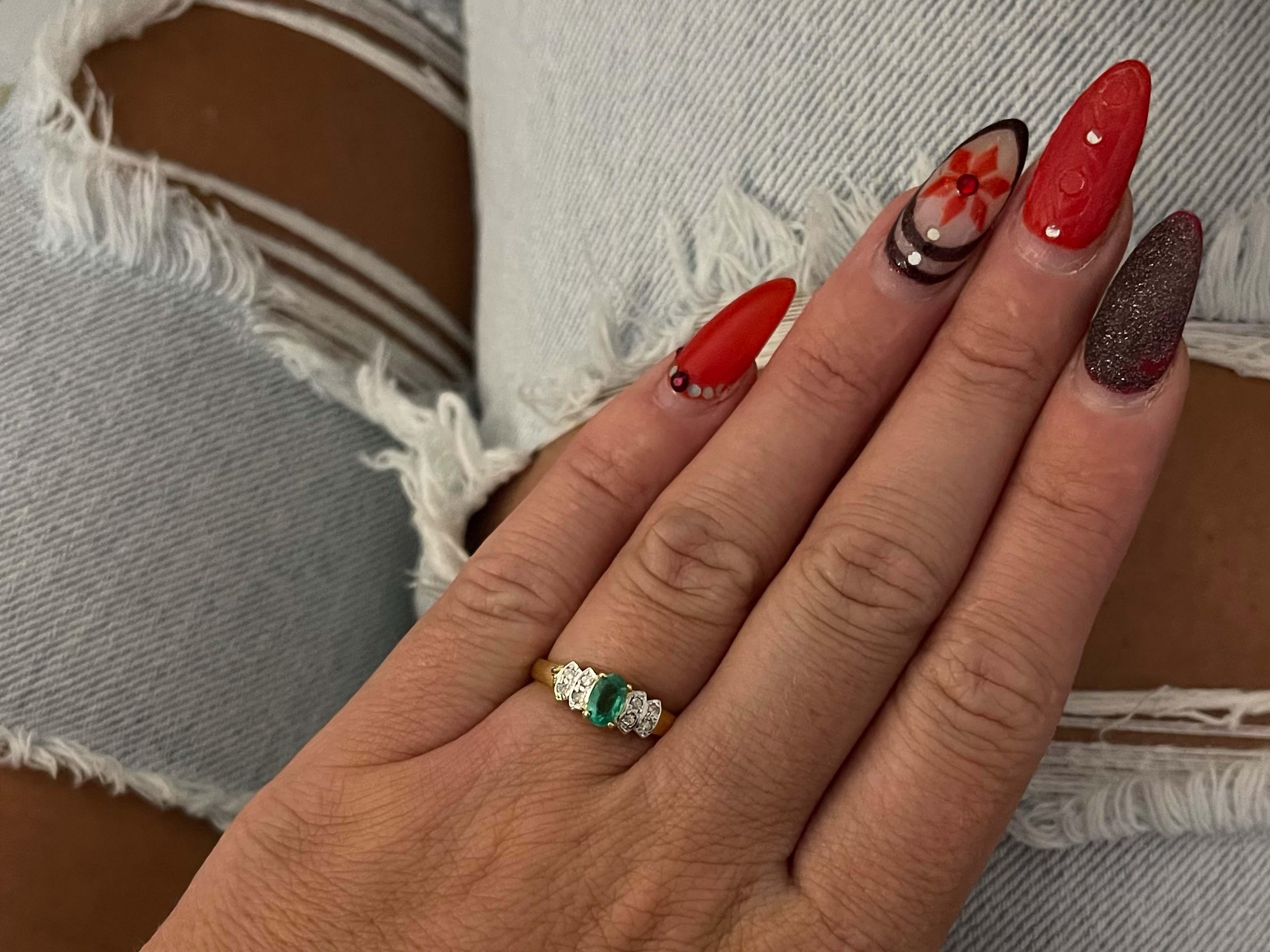 Item Specifications:

Metal: 14K Yellow Gold

Style: Statement Ring

Ring Size: 6 (resizing available for a fee)

Total Weight: 2.1 Grams

Ring Height: 5.84 mm

Gemstone Specifications:

Gemstone: 1 Green Emerald

Shape: Oval

Emerald Measurements: