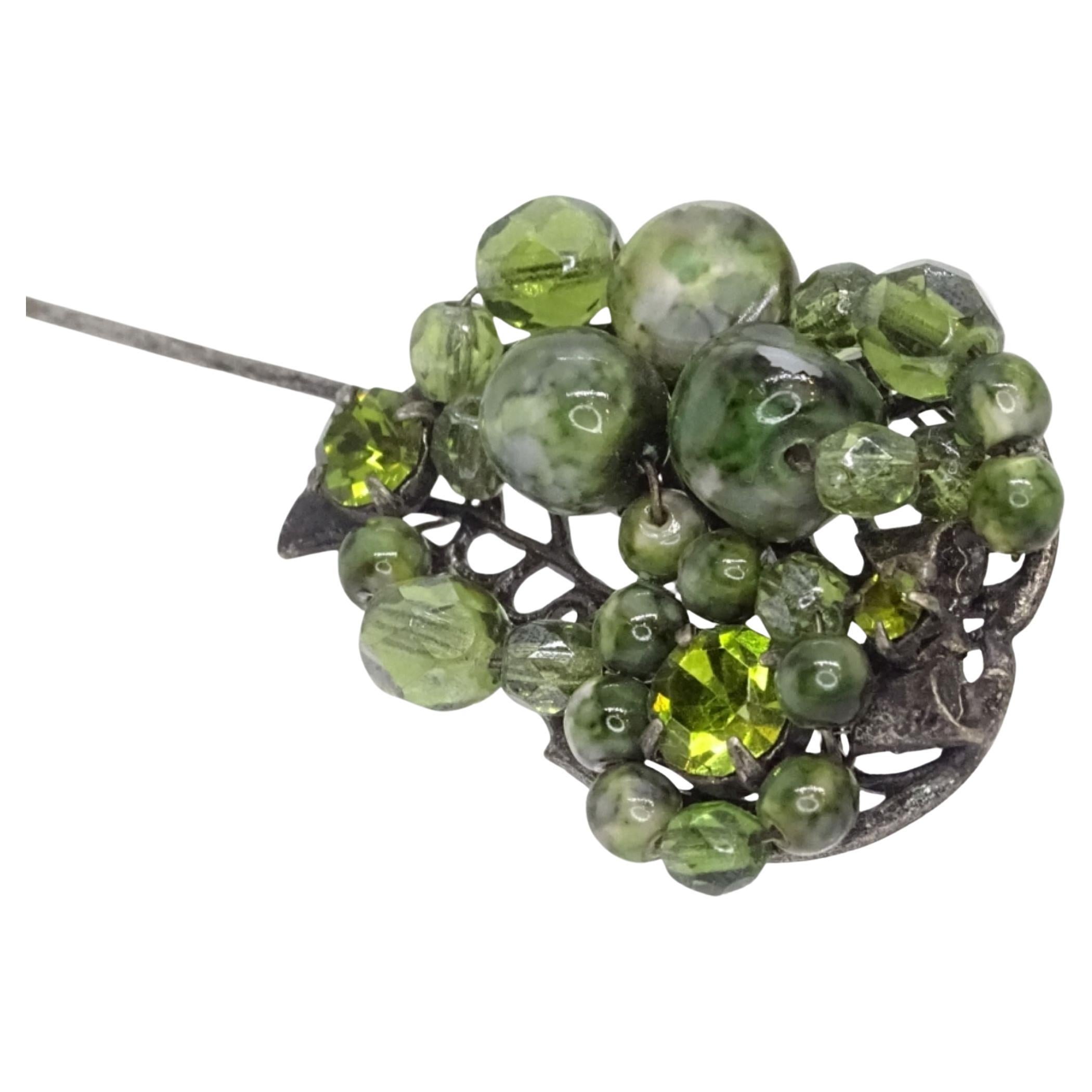 Spilla vintage verde, acciaio, vetro, peridoto e serpentino, Francia