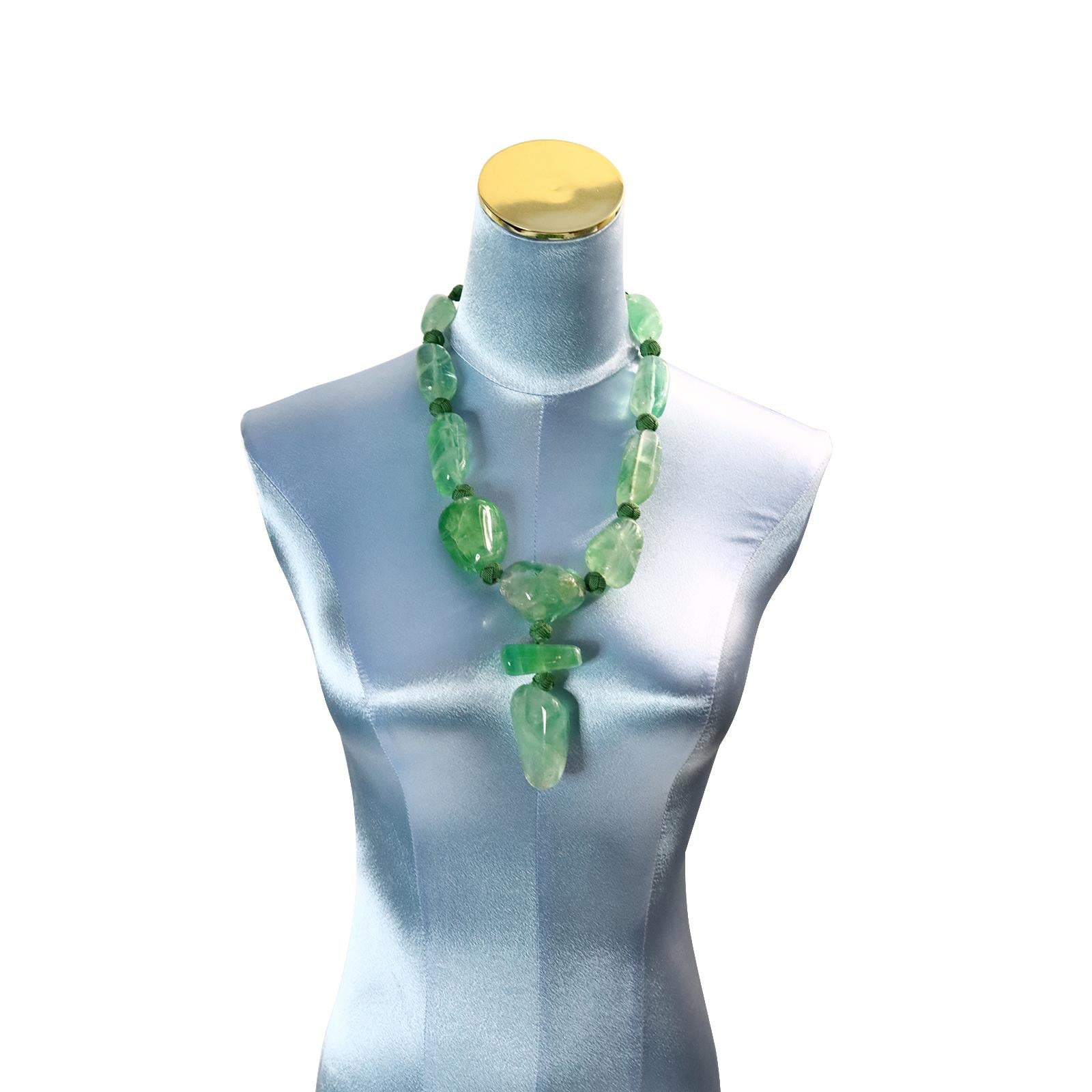green cord necklace