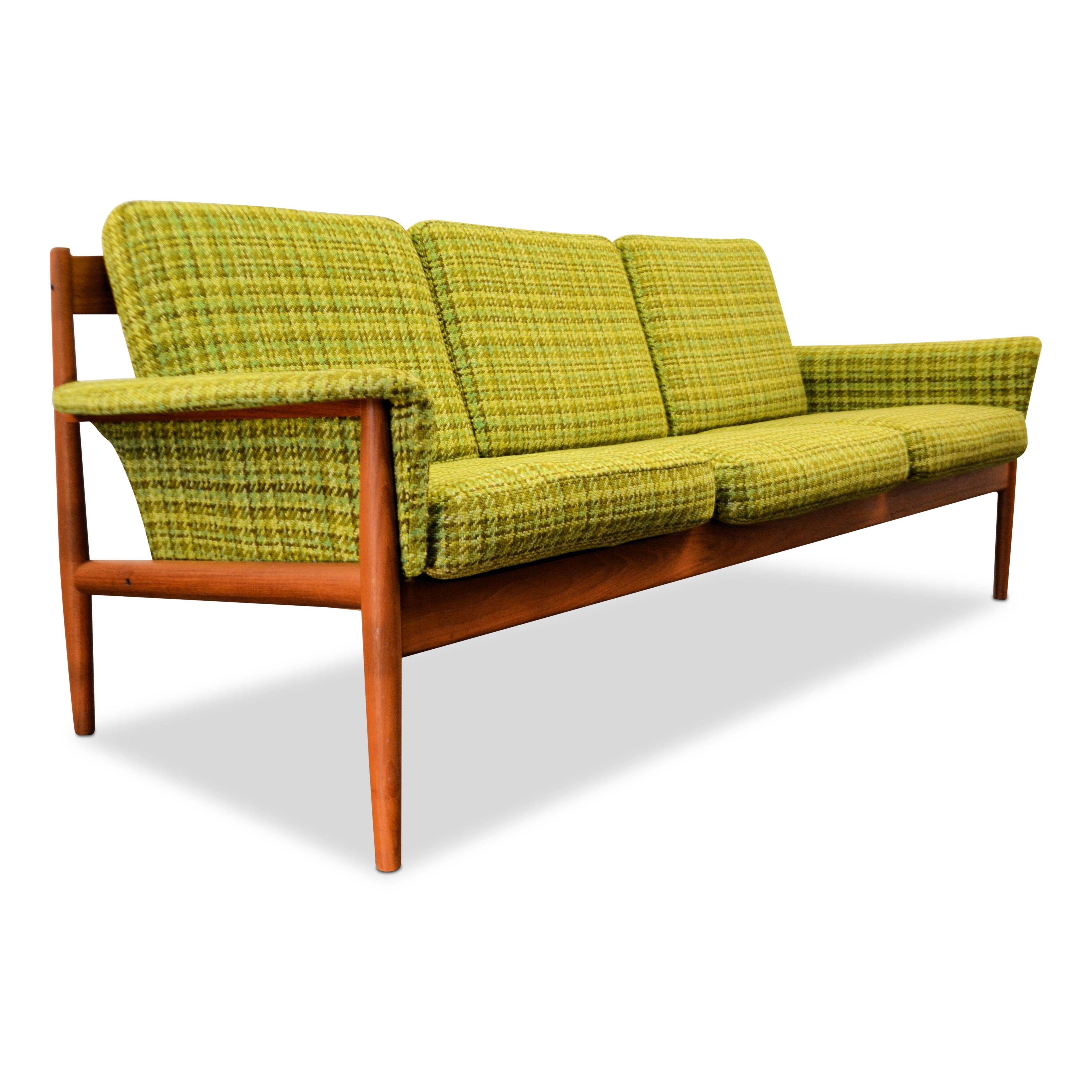 Vintage three-seat sofa in solid teak. Designed by Danish top designer Grete Jalk for France & Son. Grete Jalk was a driving force behind the global Expansion of Danish Design. Her simple but stylish organic furniture, wallpaper and fabric designs