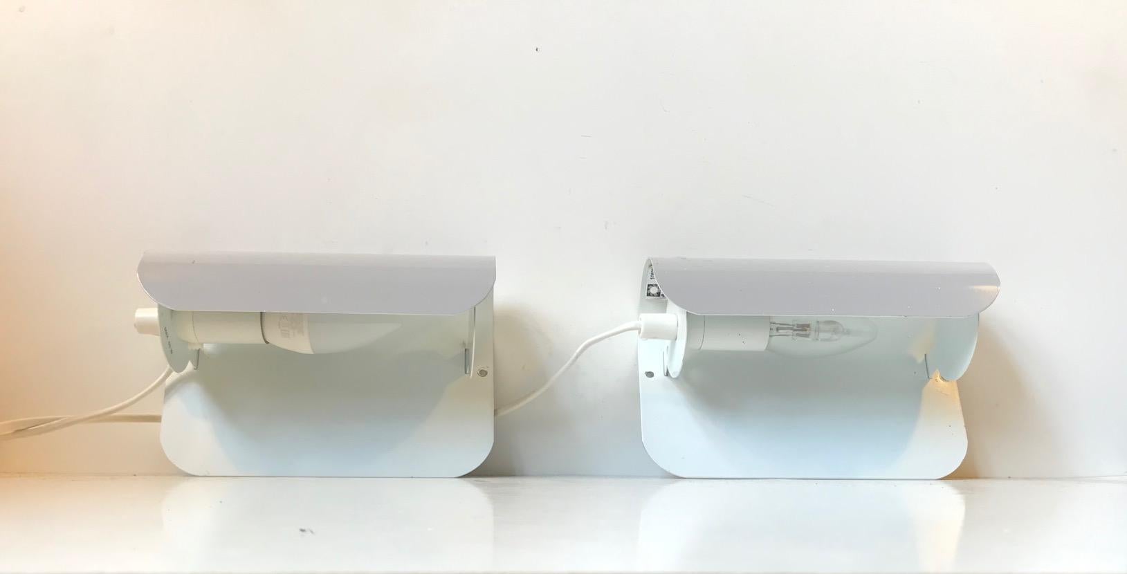 - Minimalist sconces, set of 2
- Made of powder-coated steel
- Designed and manufactured by Aneta
- Swedish design, 1970s.