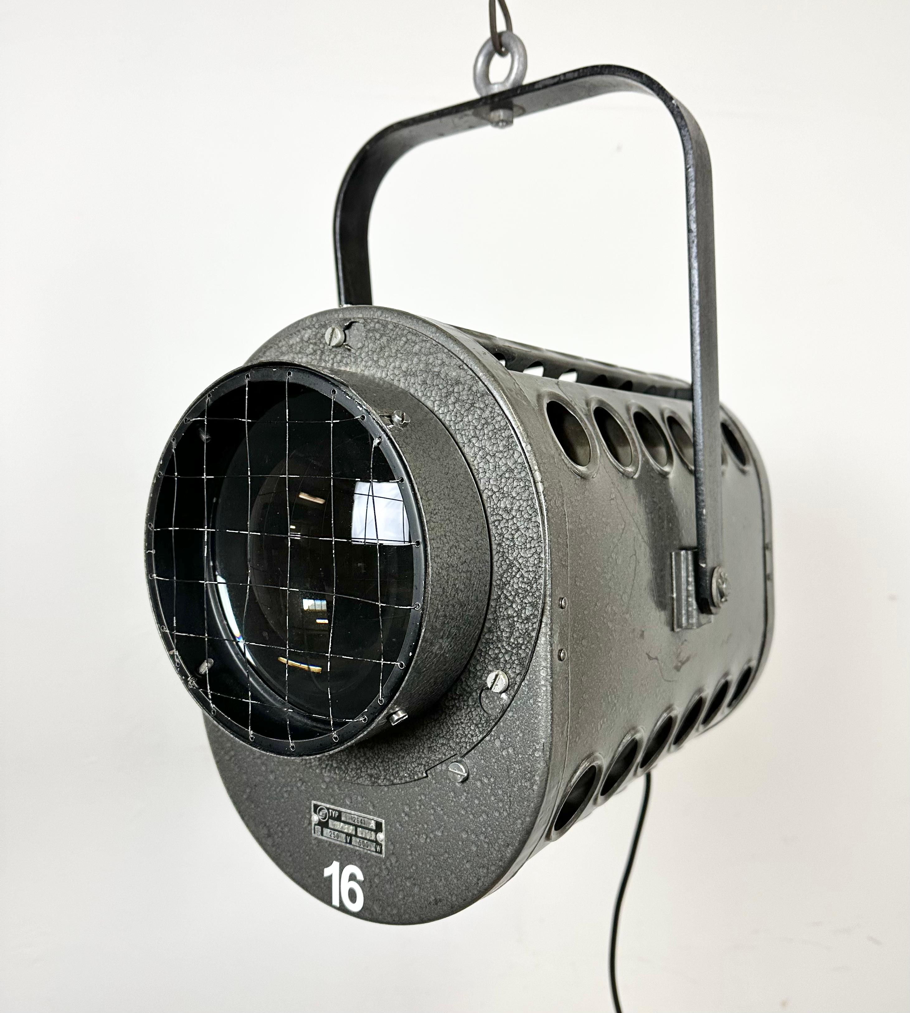 - Vintage theatre spotlight made by Elektrosvit  in former Czechoslovakia during the 1980s 
- It features a grey hammerpaint metal body and clear glass lens cover
- The porcelain socket requires E27/ E26 lightbulbs 
- New wire
-The height of the