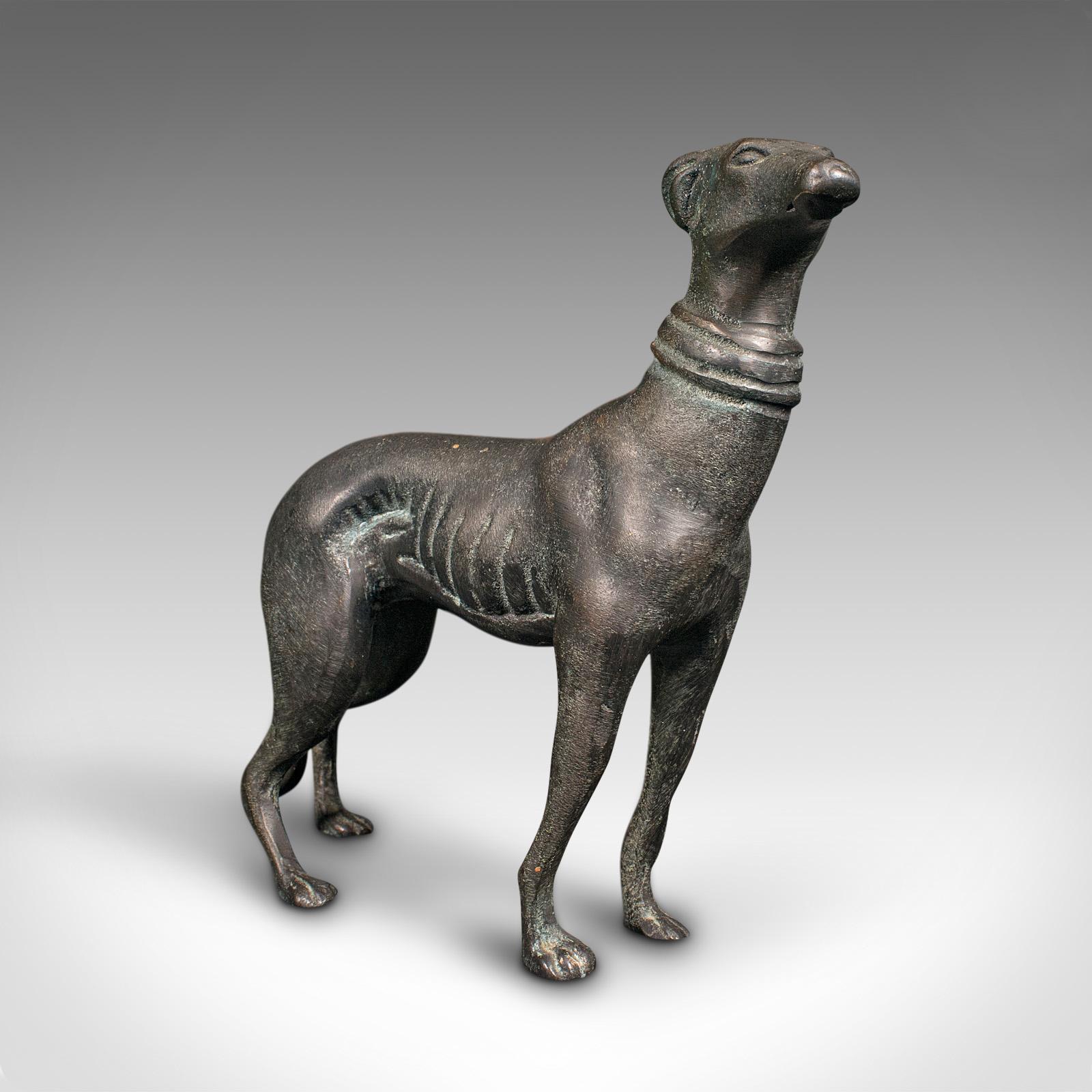This is a vintage greyhound figure. A French, bronze dog statue, dating to the Art Deco period, circa 1930.

Graceful and endearing, a treat for the display case or mantle
Displaying a desirable aged patina in good original order
Crafted in