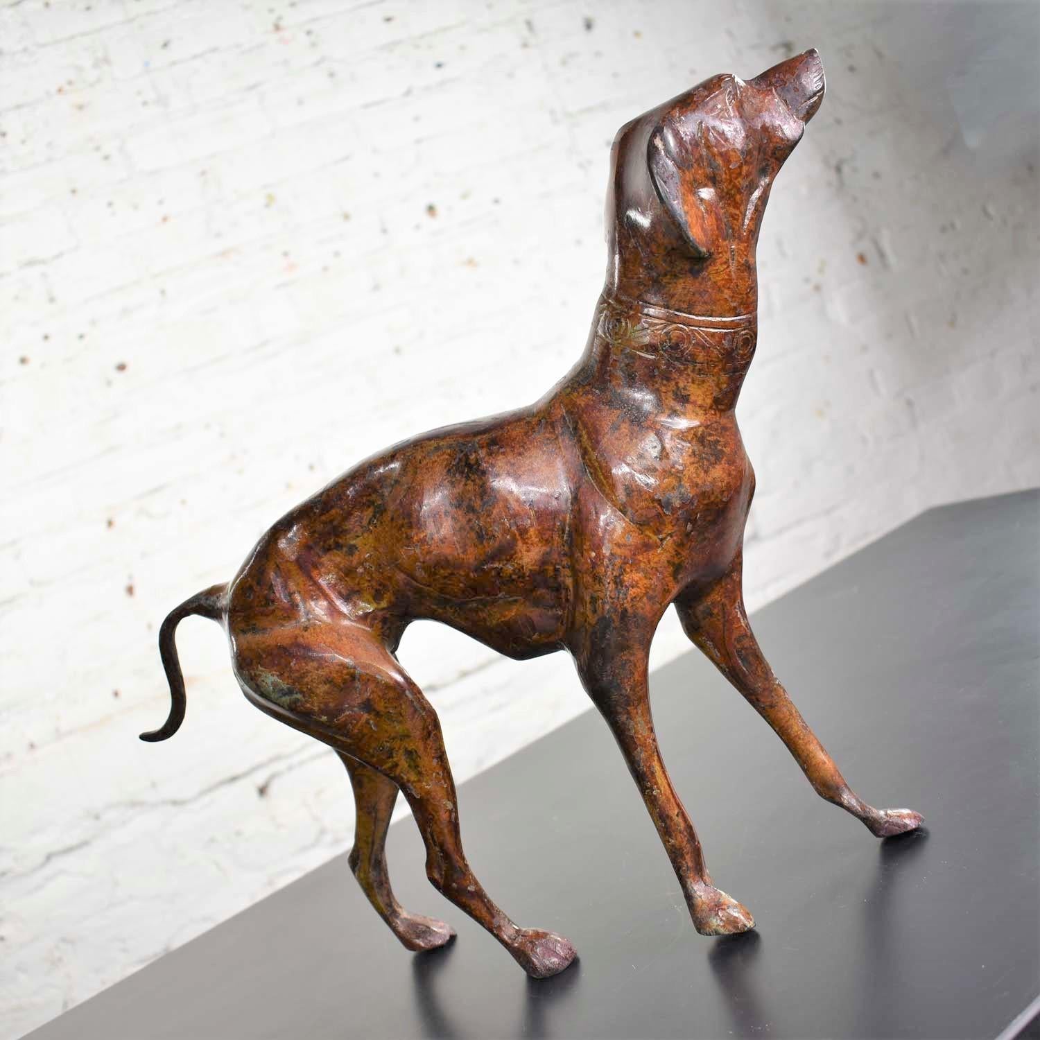 Handsome medium size bronze sculpture of a greyhound or whippet. It is in fabulous vintage condition. Please see photos, circa late 20th century.

If you are a dog lover (and who isn’t?), you will adore this stately statue of one of the oldest of