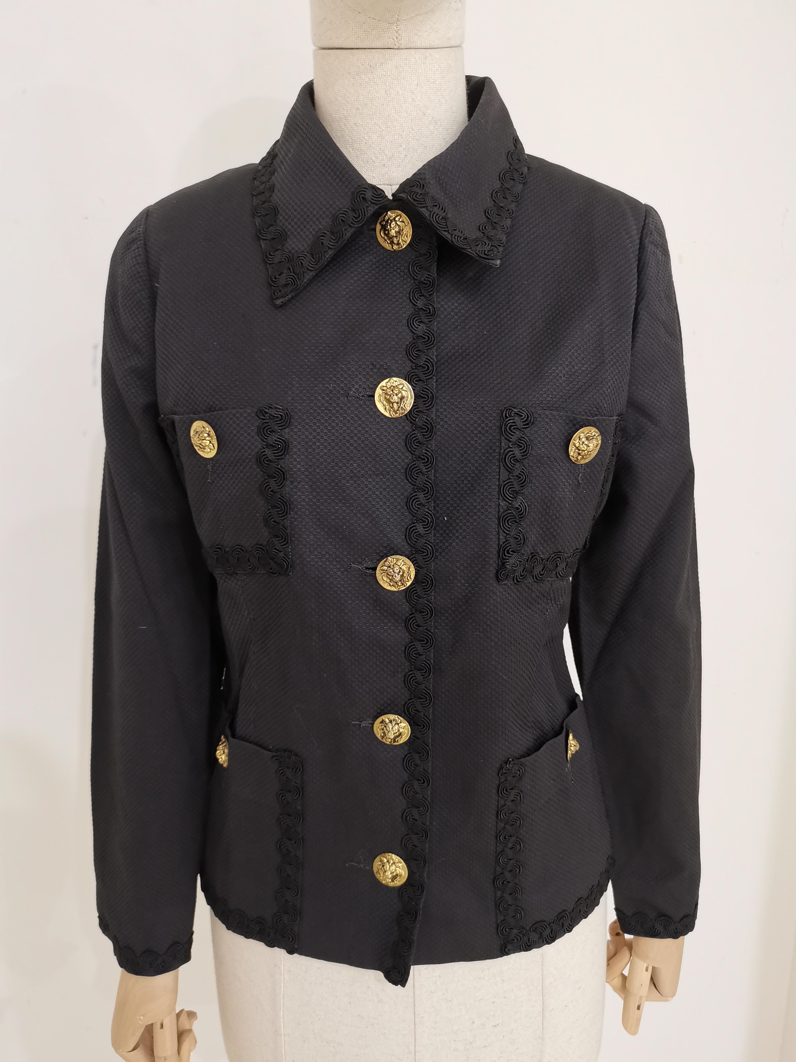 Vintage Grilli black jacket
totally made in italy in size 40
embellished with gold tone buttons