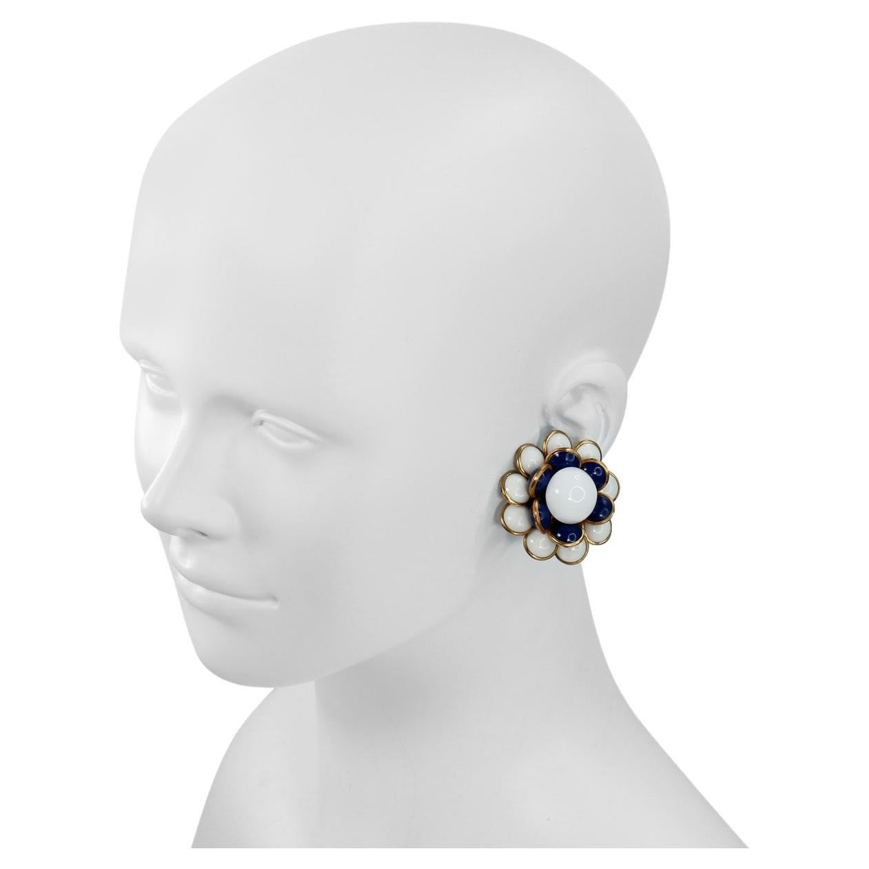 Vintage Gripoix Navy, White and Gold Flower Earrings. Layered upward and 3D. Clip On.

Guy de Maupassant wrote a famous story about a necklace. The story is about a young, pretty, intelligent, well educated but poorly endowed bride who has to marry