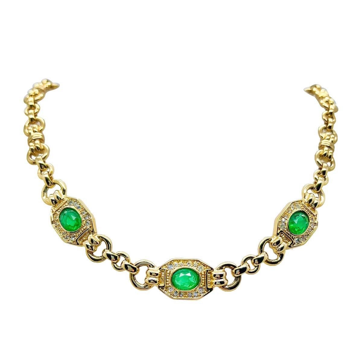 A Vintage Grossé Emerald Crystal Necklace. Oozing the look of emerald and diamond this chain necklace by Grossé plays to all the design strengths of this luxury costume jeweller. A chunky fancy link chain in lustrous gold plate is interspersed with