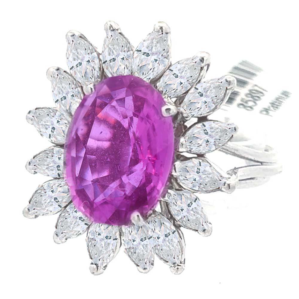 GRS Certified No Heat Madagascar Pink Sapphire Diamond Halo Ring. This platinum masterpiece showcases a 4.01-carat pink sapphire, certified by GRS, encircled by 16 marquise-cut diamonds. With a captivating oval shape measuring 12.28 x 9.08 x 4.20