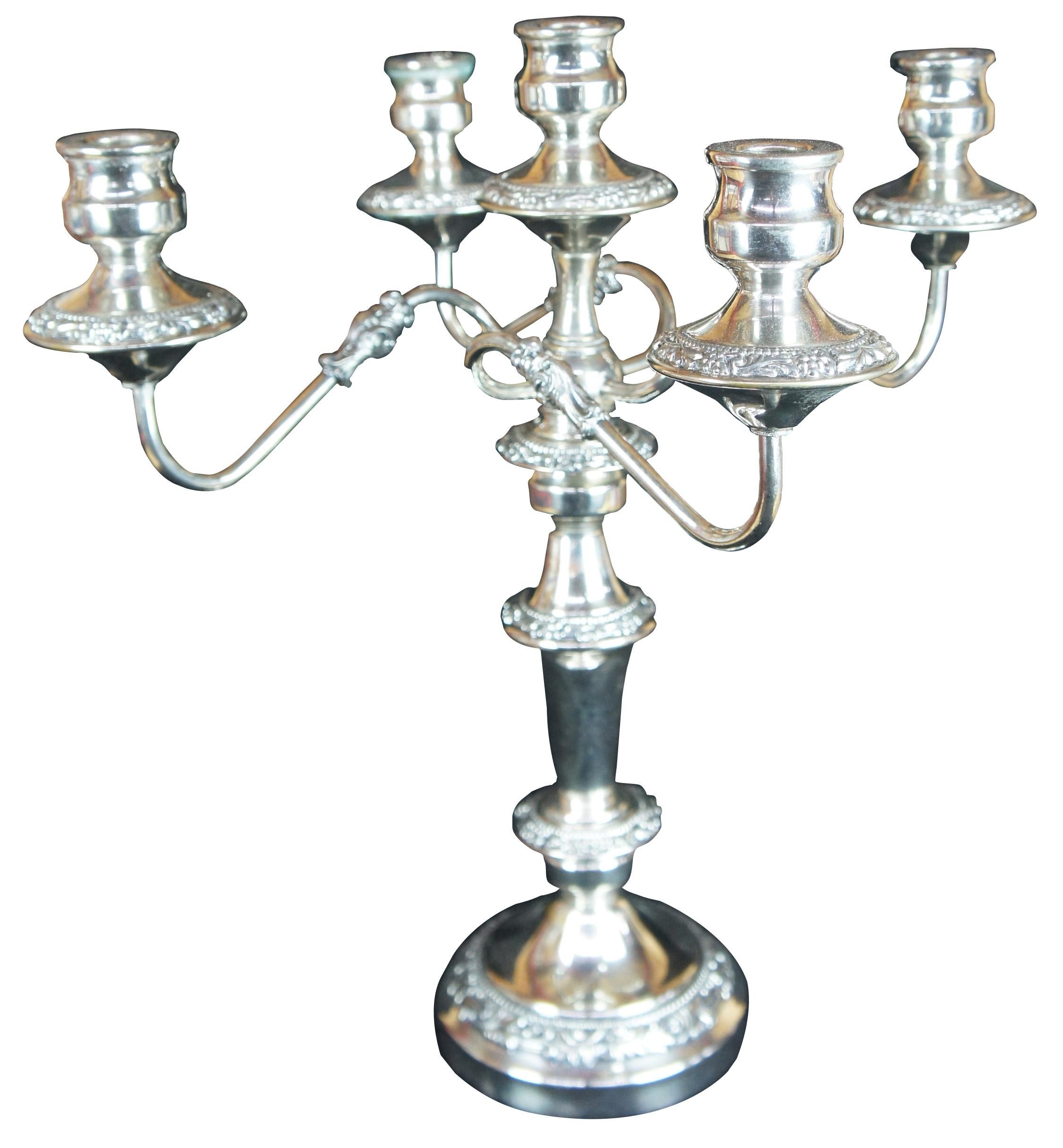 Vintage Goldfeder Silver Co five arm convertible candelabra candlestick featuring grape, acanthus leaves and beaded design.

Candelabra 17.5