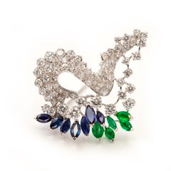 Vintage Gubelin Platinum Diamond Emerald Sapphire Brooch