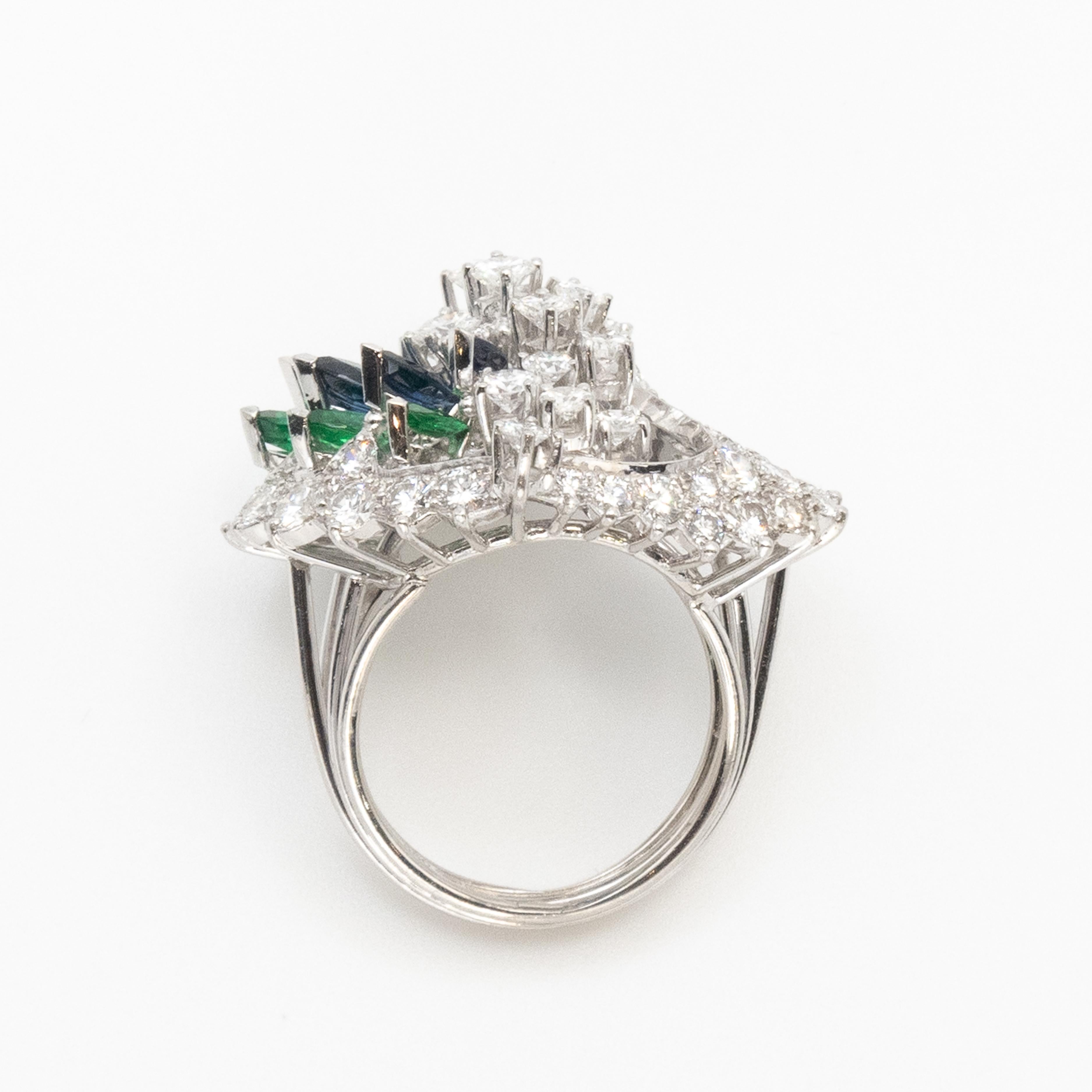 Vintage Gubelin Platinum Diamond Emerald Sapphire Ring In Excellent Condition For Sale In New York, NY