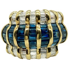 Bague vintage Gubelin en or jaune avec saphirs et diamants