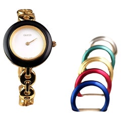 Reloj de pulsera de señora vintage Gucci 11/12.2 chapado en oro, correa de brazalete, biseles