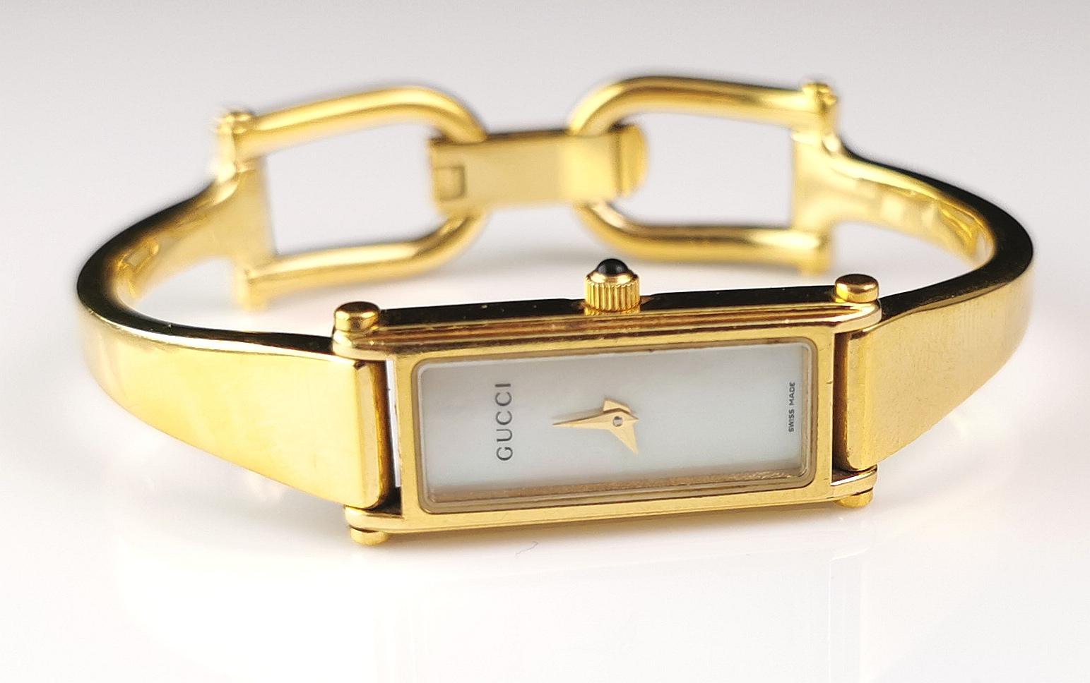 Modern Vintage Gucci 1500l gold plated ladies wristwatch, Horsebit bangle strap 