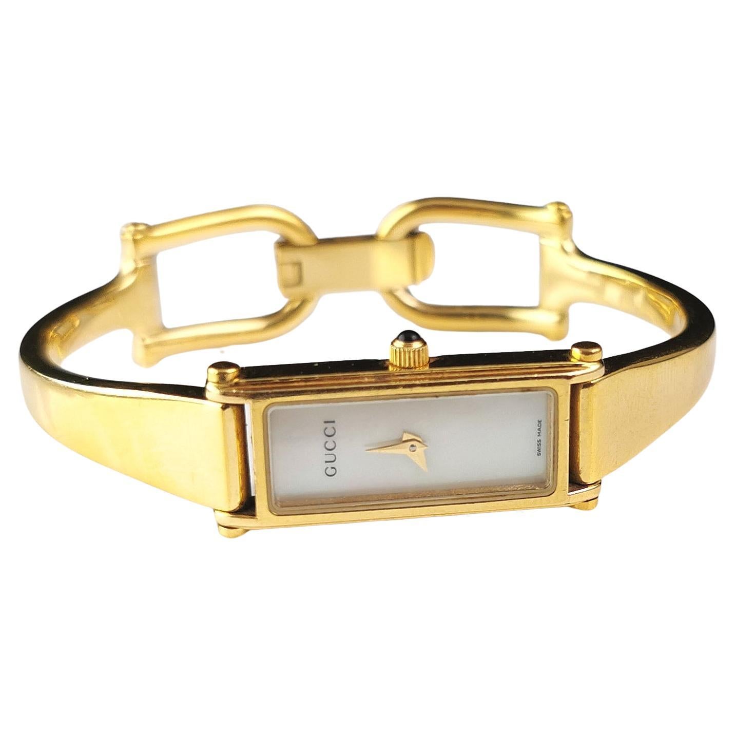 Vintage Gucci 1500l gold plated ladies wristwatch, Horsebit bangle