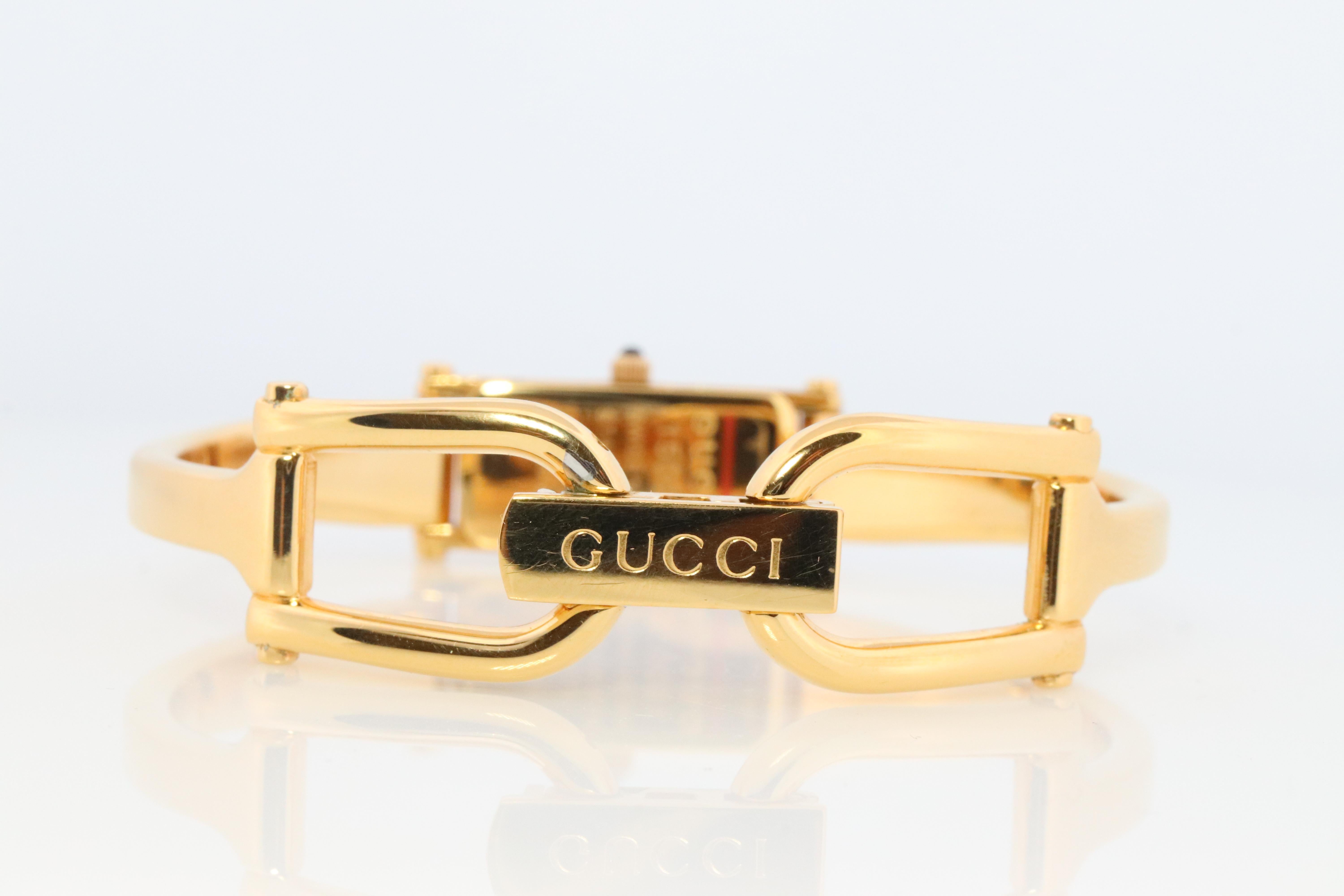 Modern Vintage GUCCI 1500L Quartz Watch Timepiece. Gucci Gold Tone Bangle Wrist Watch