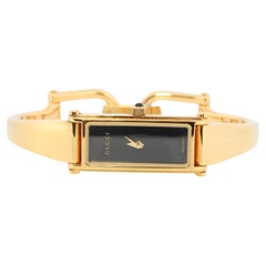Vintage GUCCI 1500L Quartz Watch Timepiece. Gucci Gold Tone Bangle Wrist Watch