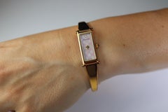 Vintage GUCCI 1500L Quartz Wrist Watch. Gucci Gold tone LOGO Bangle Watch