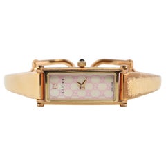Vintage GUCCI 1500L Quartz Wrist Watch. Gucci Gold tone LOGO Bangle Watch